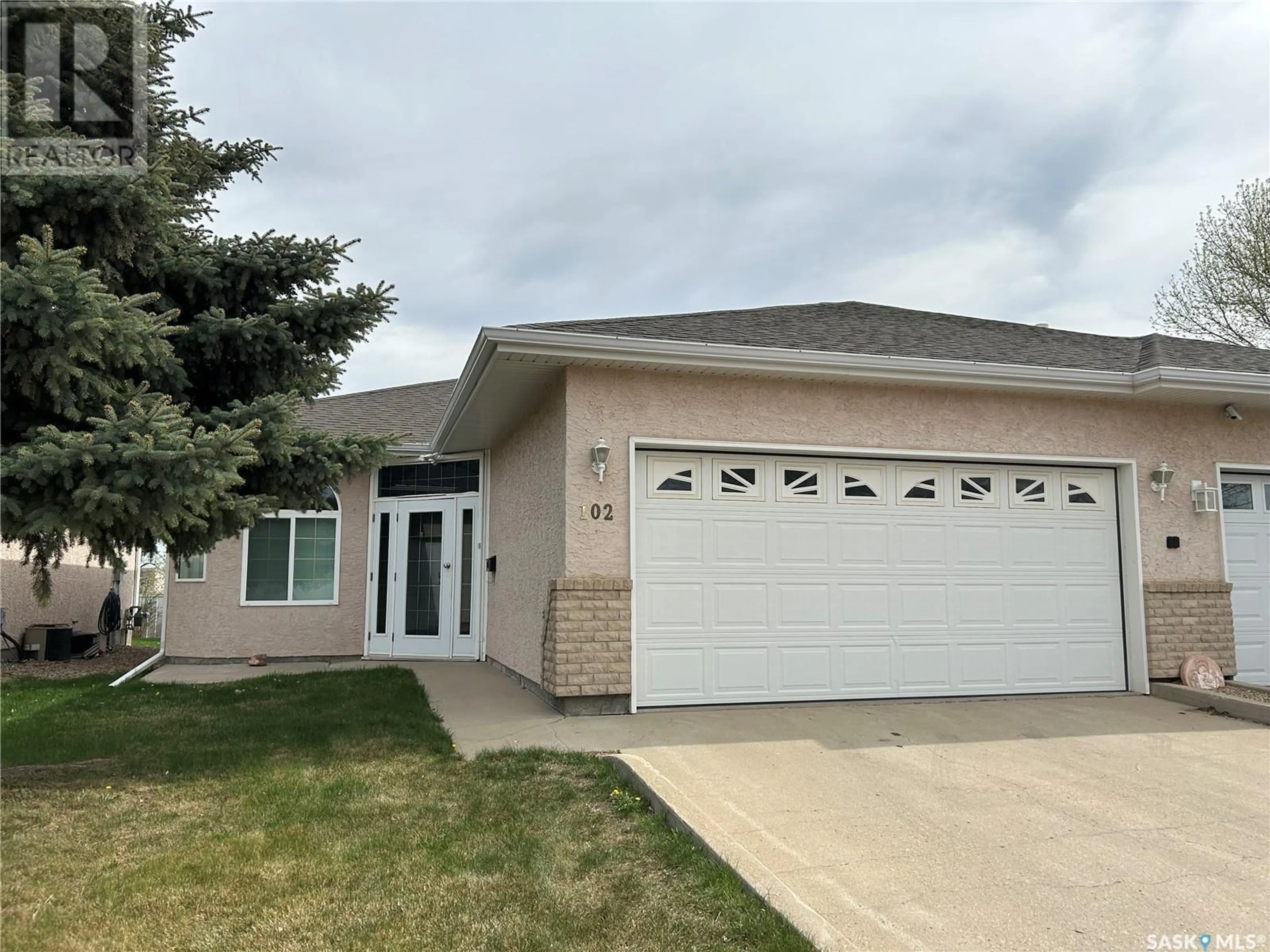 Home with vinyl exterior material, street for 102 - 1091 TAISEY CRESCENT, Estevan Saskatchewan S4A2V2