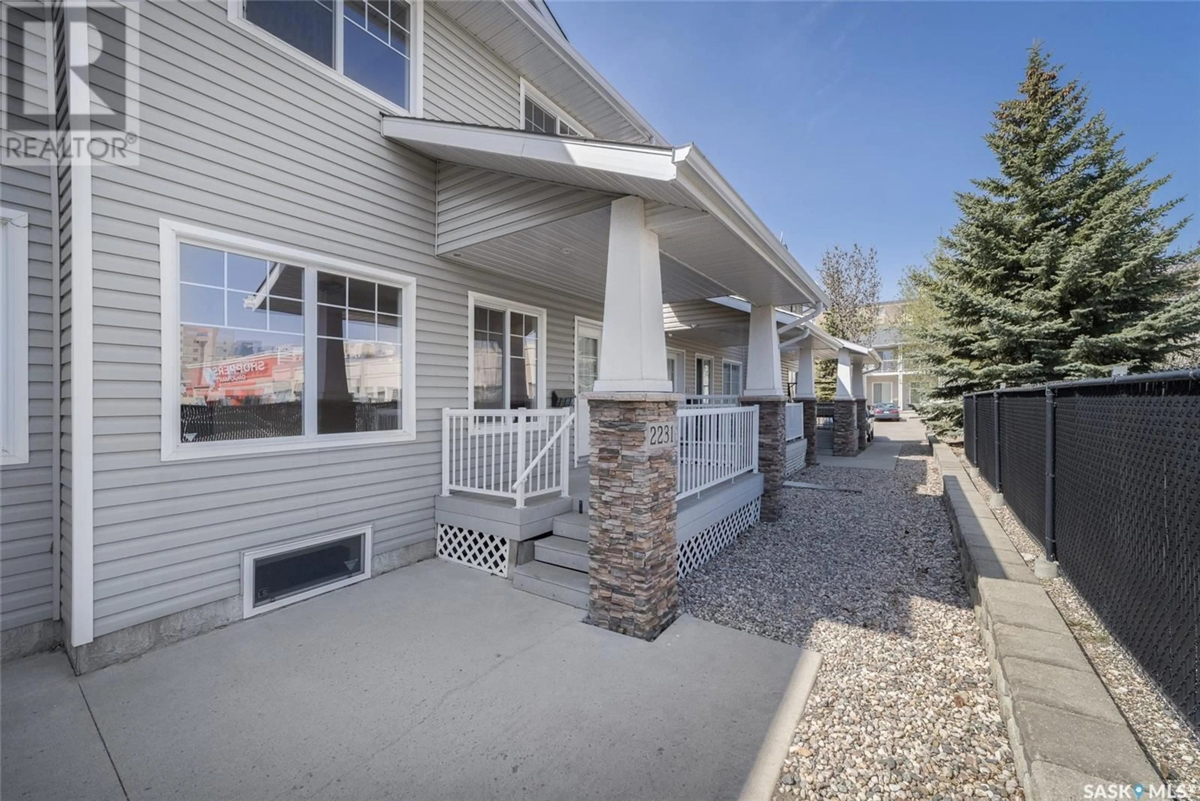 Patio, street for 2231 TREETOP LANE, Regina Saskatchewan S4P4V8