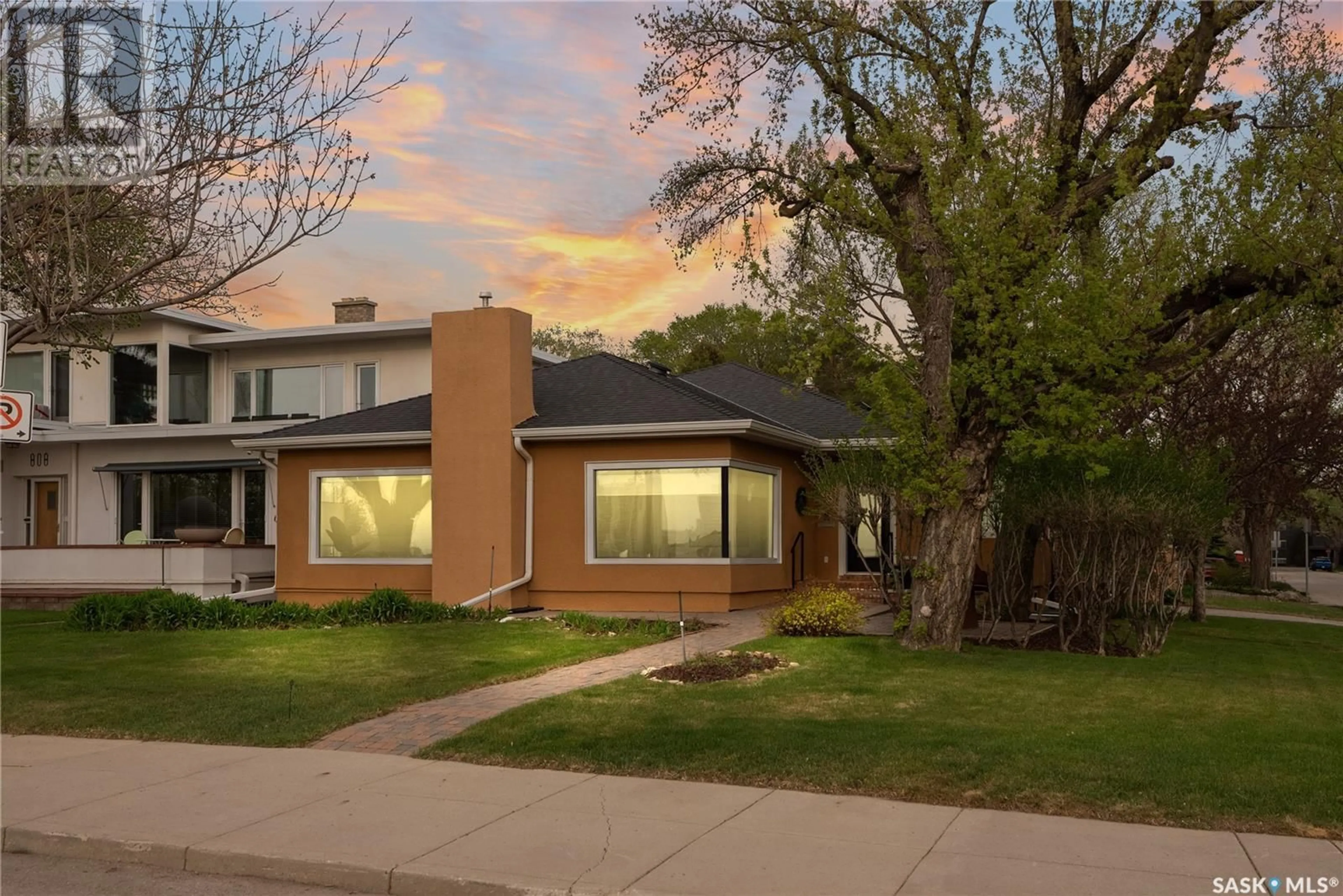 Home with brick exterior material, street for 802 SASKATCHEWAN CRESCENT, Saskatoon Saskatchewan S7N0L3