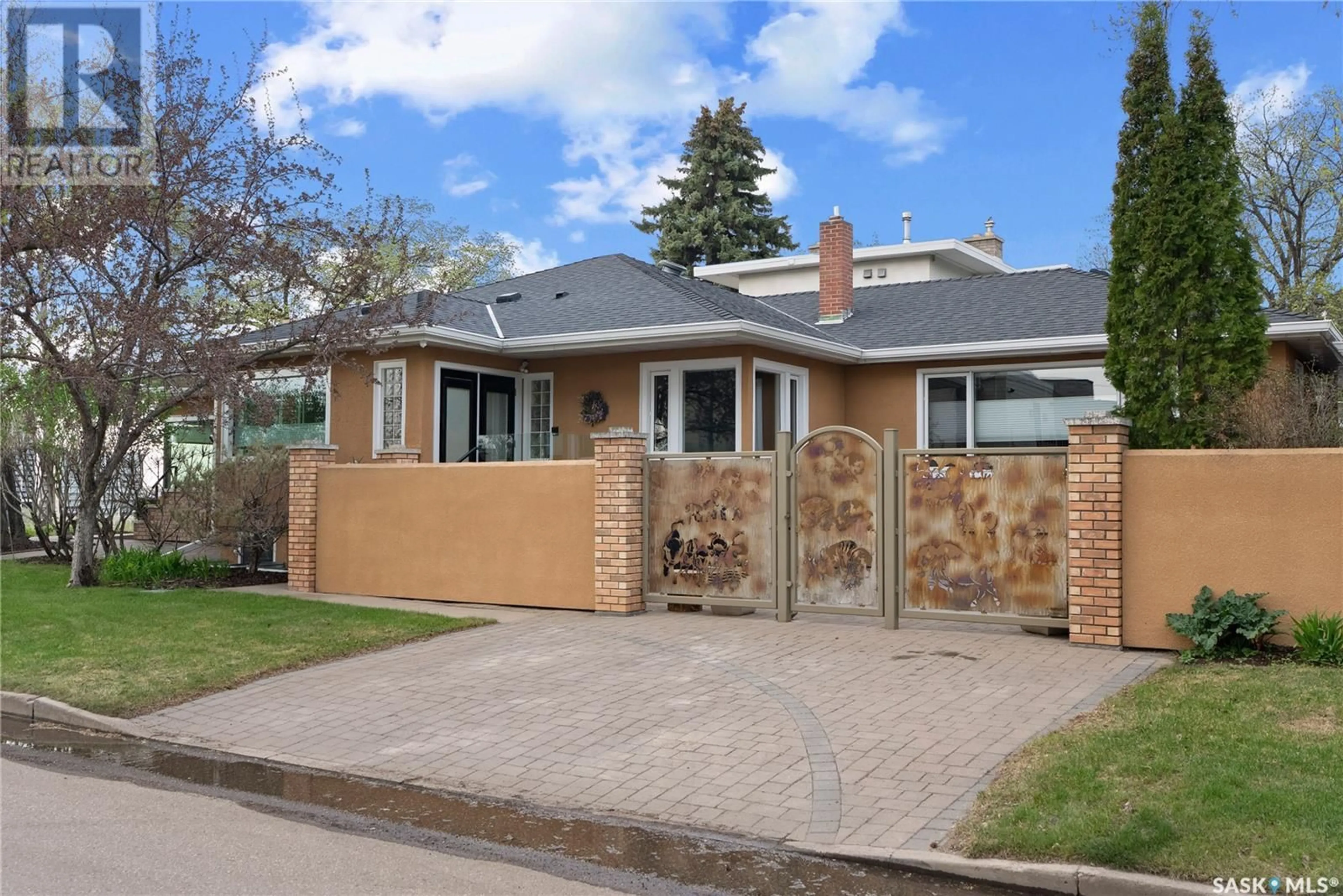 Home with brick exterior material, street for 802 SASKATCHEWAN CRESCENT, Saskatoon Saskatchewan S7N0L3