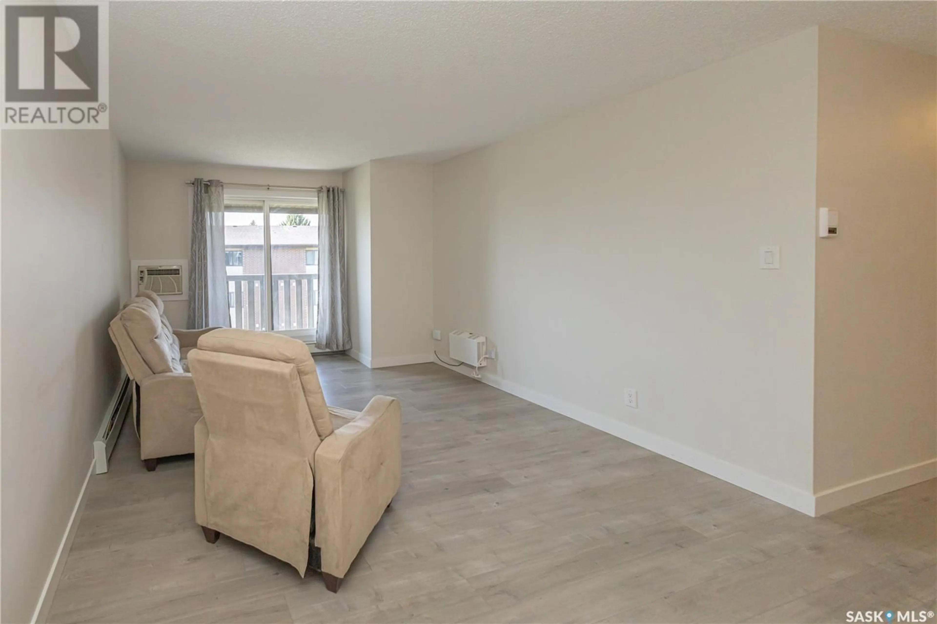 Living room with furniture, unknown for 310 315 TAIT CRESCENT, Saskatoon Saskatchewan S7H5L6