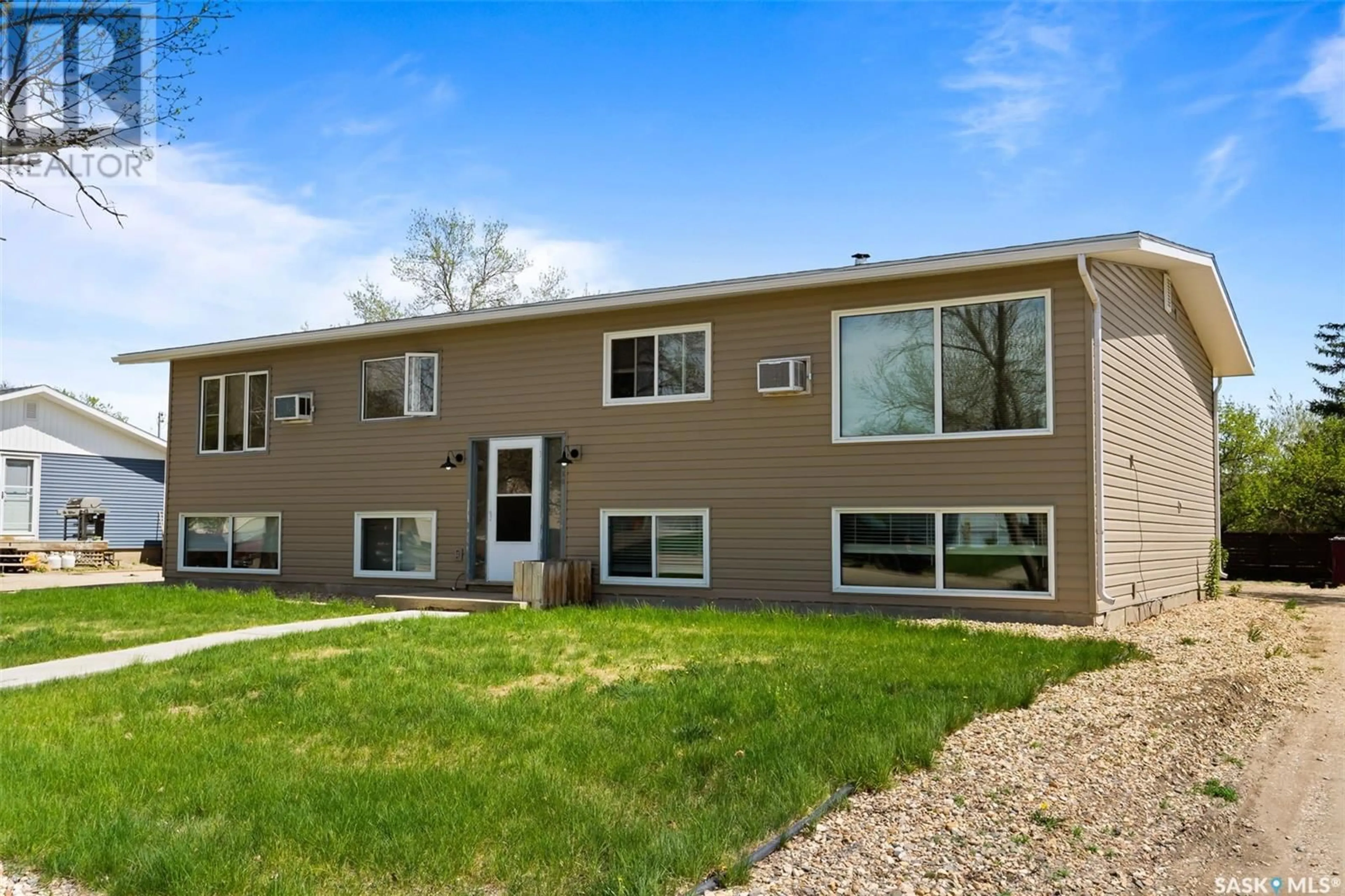 Home with vinyl exterior material, street for 220 QUEEN STREET, Milestone Saskatchewan S0G3L0