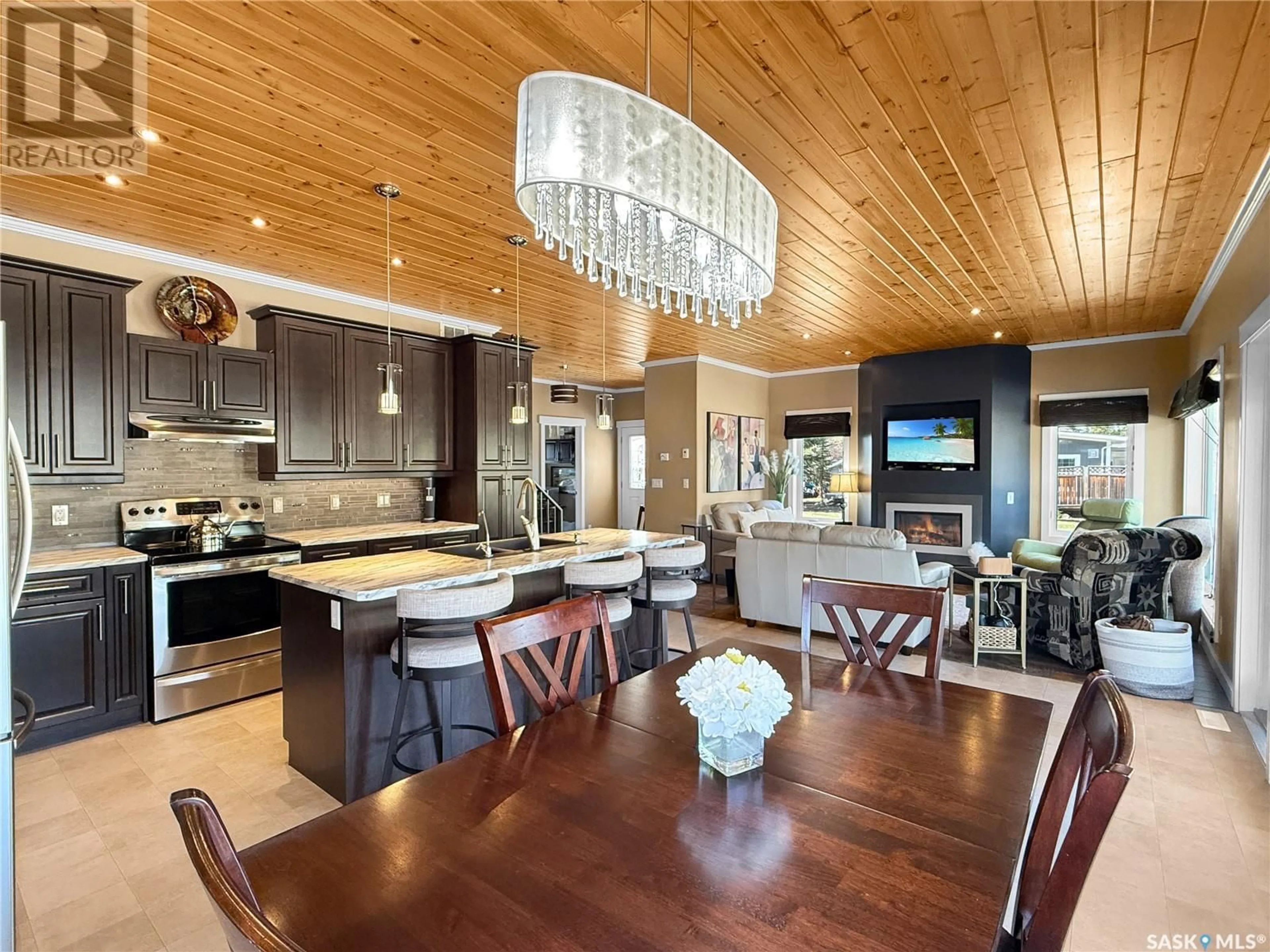 Open concept kitchen, wood/laminate floor for 3 WHITE POPLAR CRESCENT, Candle Lake Saskatchewan S0J3E0