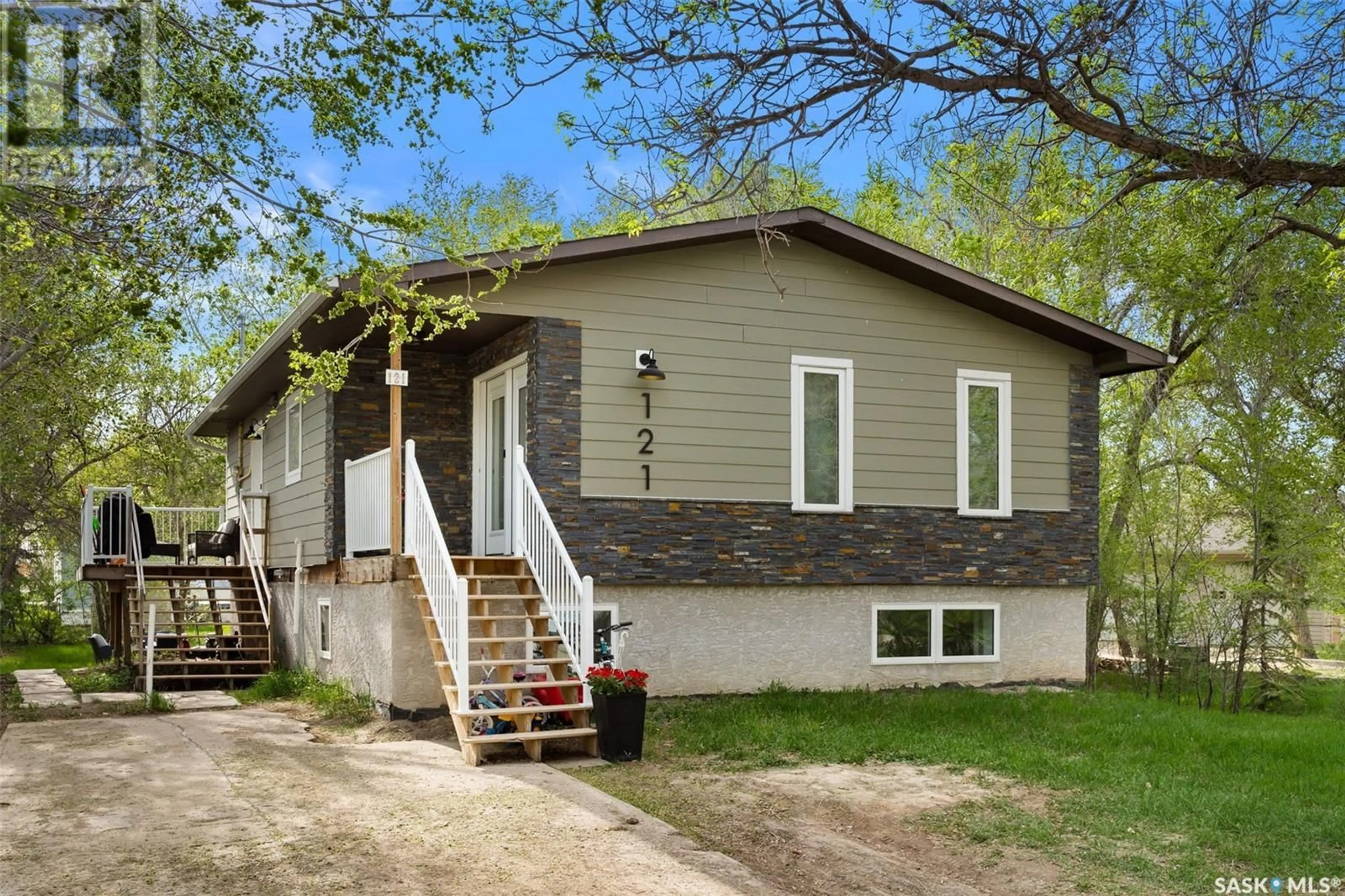 Home with vinyl exterior material, street for 121 5TH STREET, Milestone Saskatchewan S0G3L0