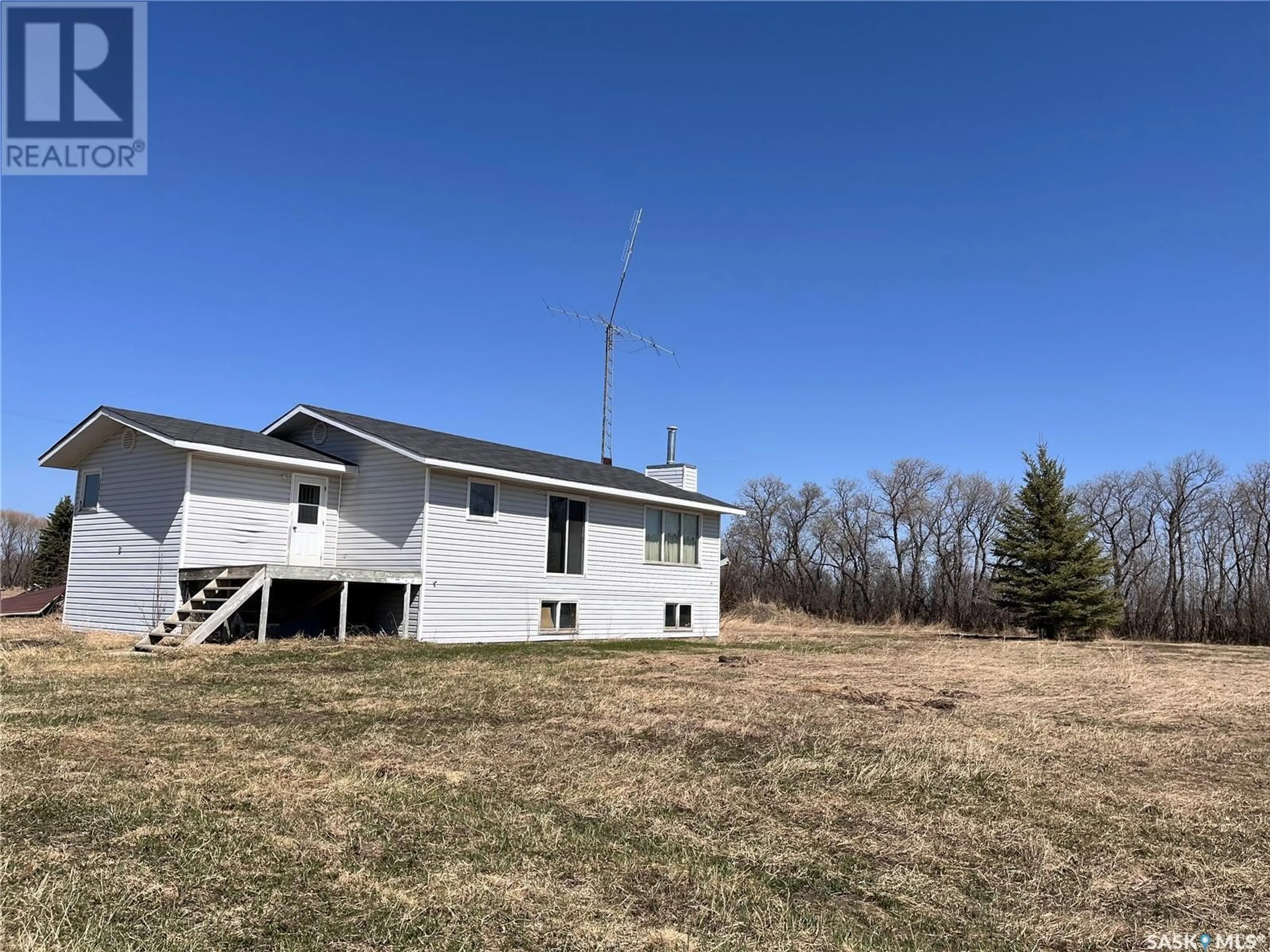 A pic from outside/outdoor area/front of a property/back of a property/a pic from drone, building for 9.88 RUSK ACREAGE, Moose Range Rm No. 486 Saskatchewan S0E0L0