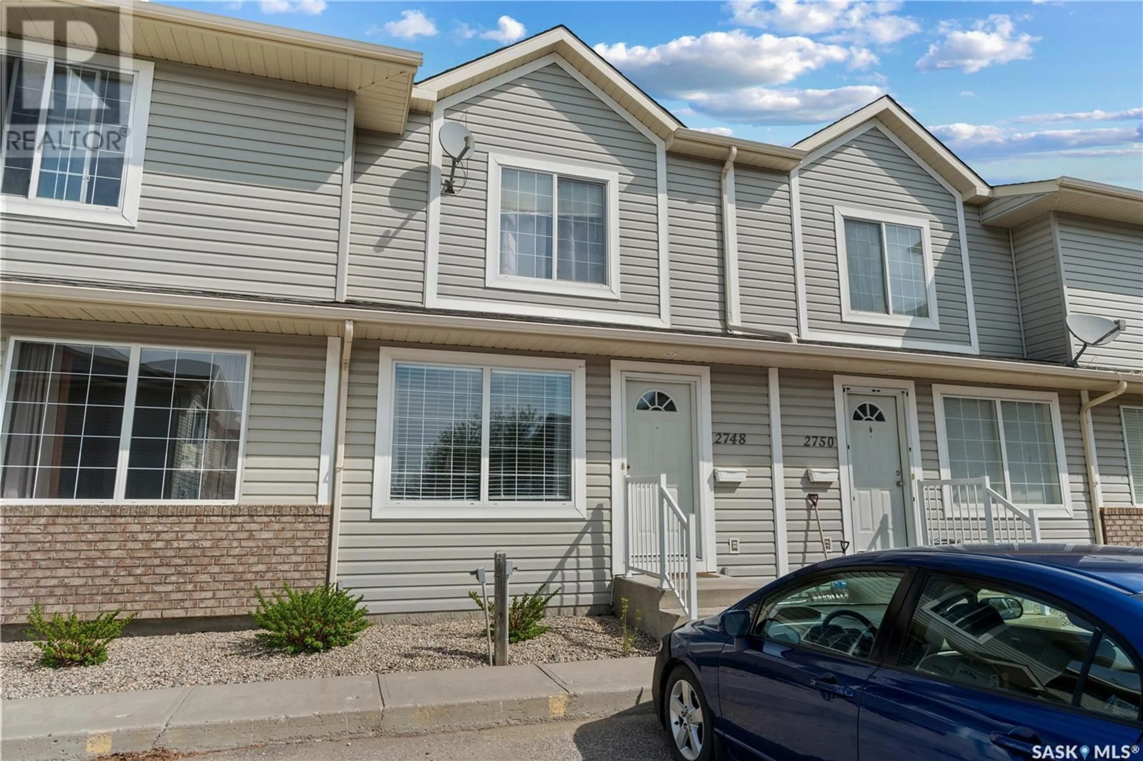 Home with vinyl exterior material, street for 2748 CRANBOURN CRESCENT, Regina Saskatchewan S4V3C1
