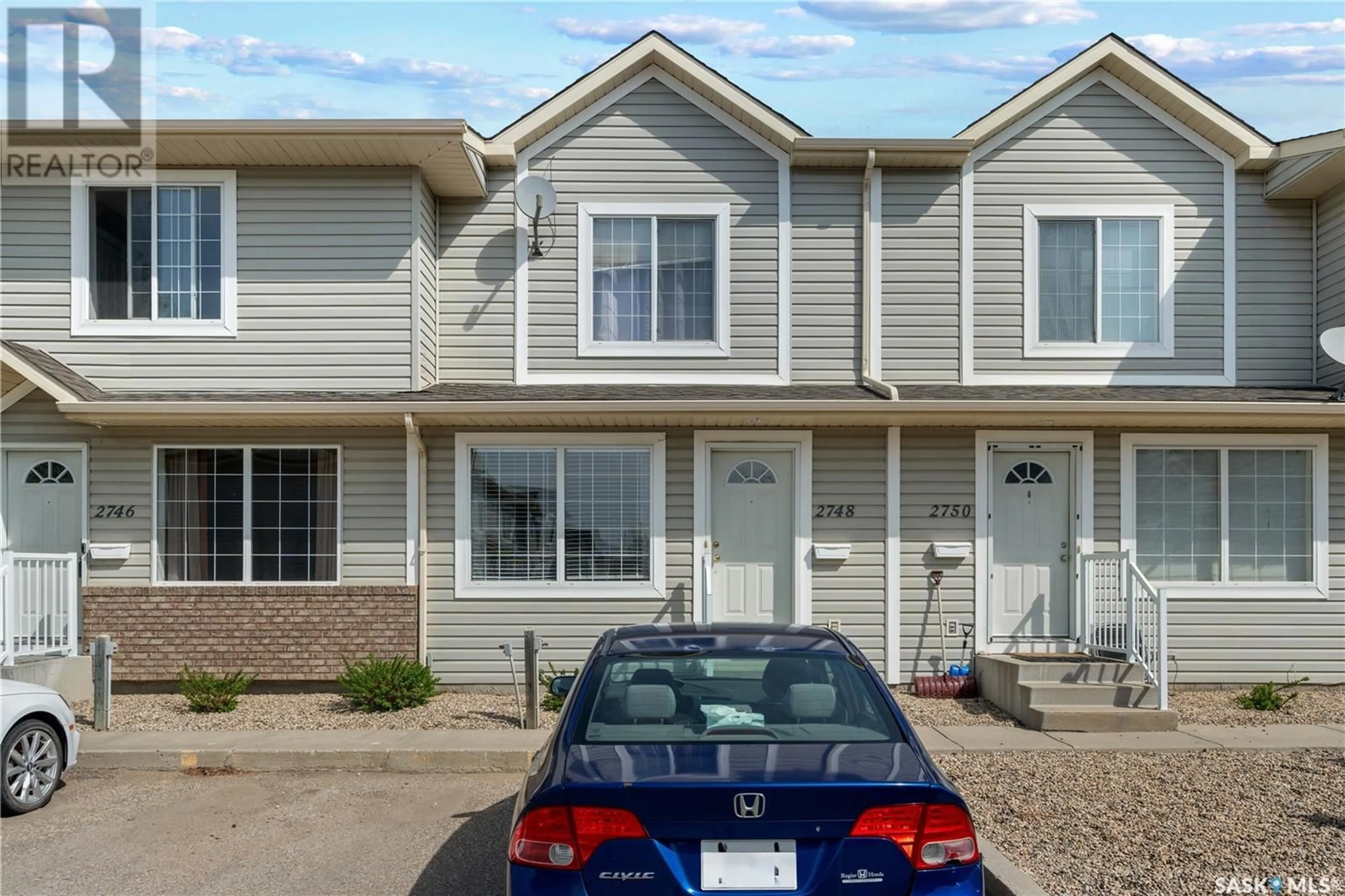 Home with vinyl exterior material, street for 2748 CRANBOURN CRESCENT, Regina Saskatchewan S4V3C1