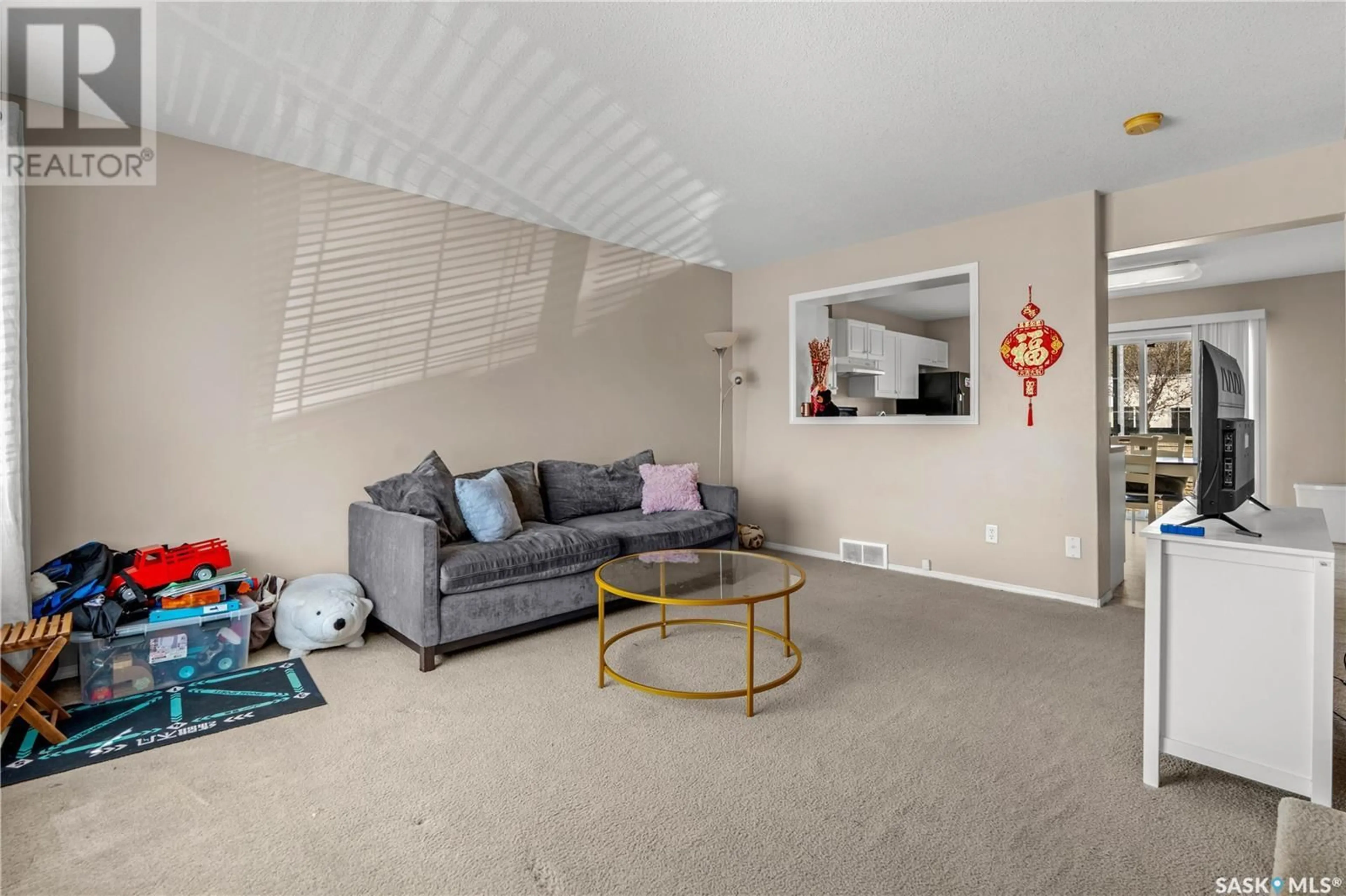 Living room with furniture, cement floor for 2748 CRANBOURN CRESCENT, Regina Saskatchewan S4V3C1