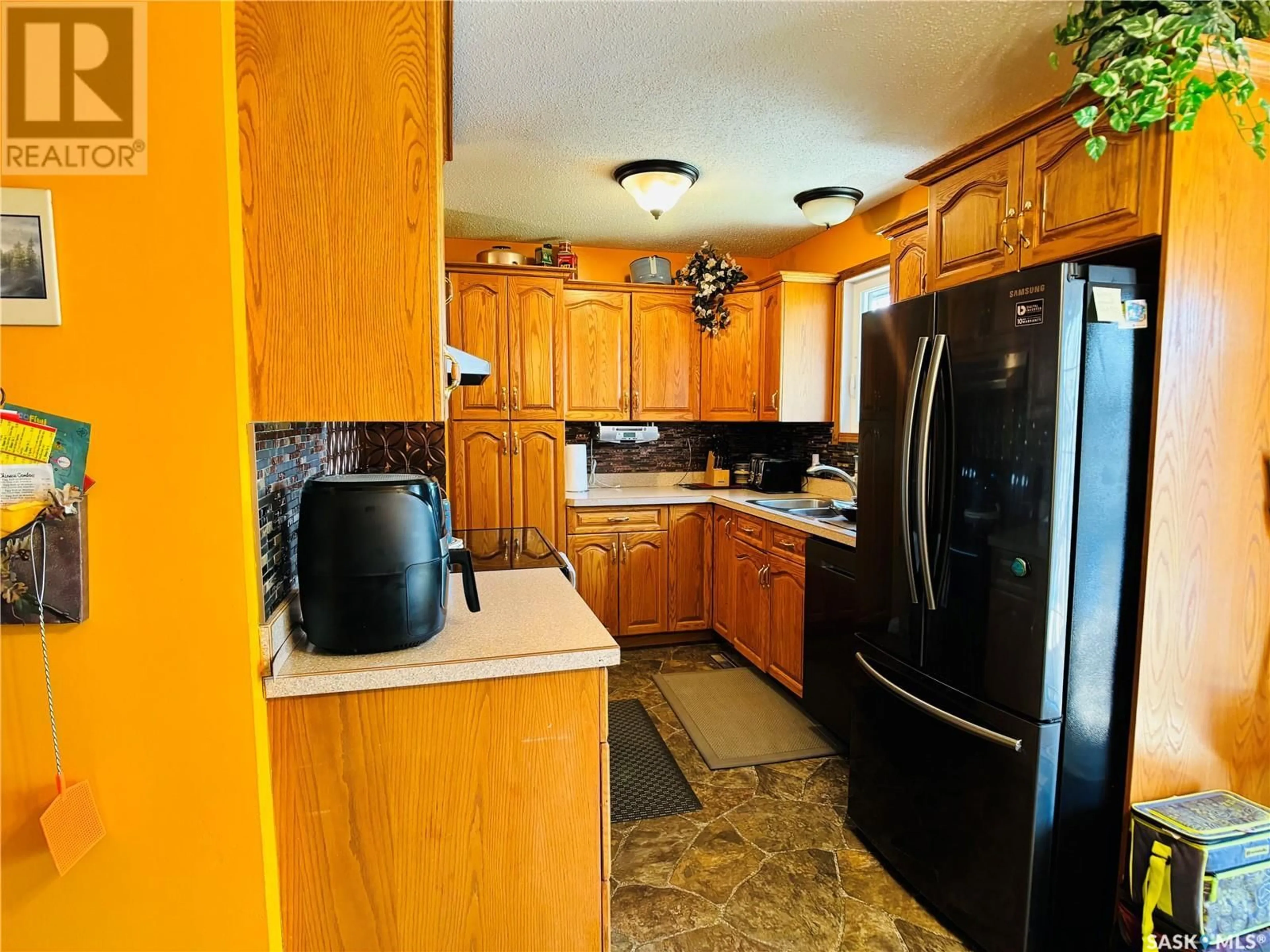 Standard kitchen, ceramic/tile floor for 226 SPRUCE DRIVE, Estevan Saskatchewan S4A2C5