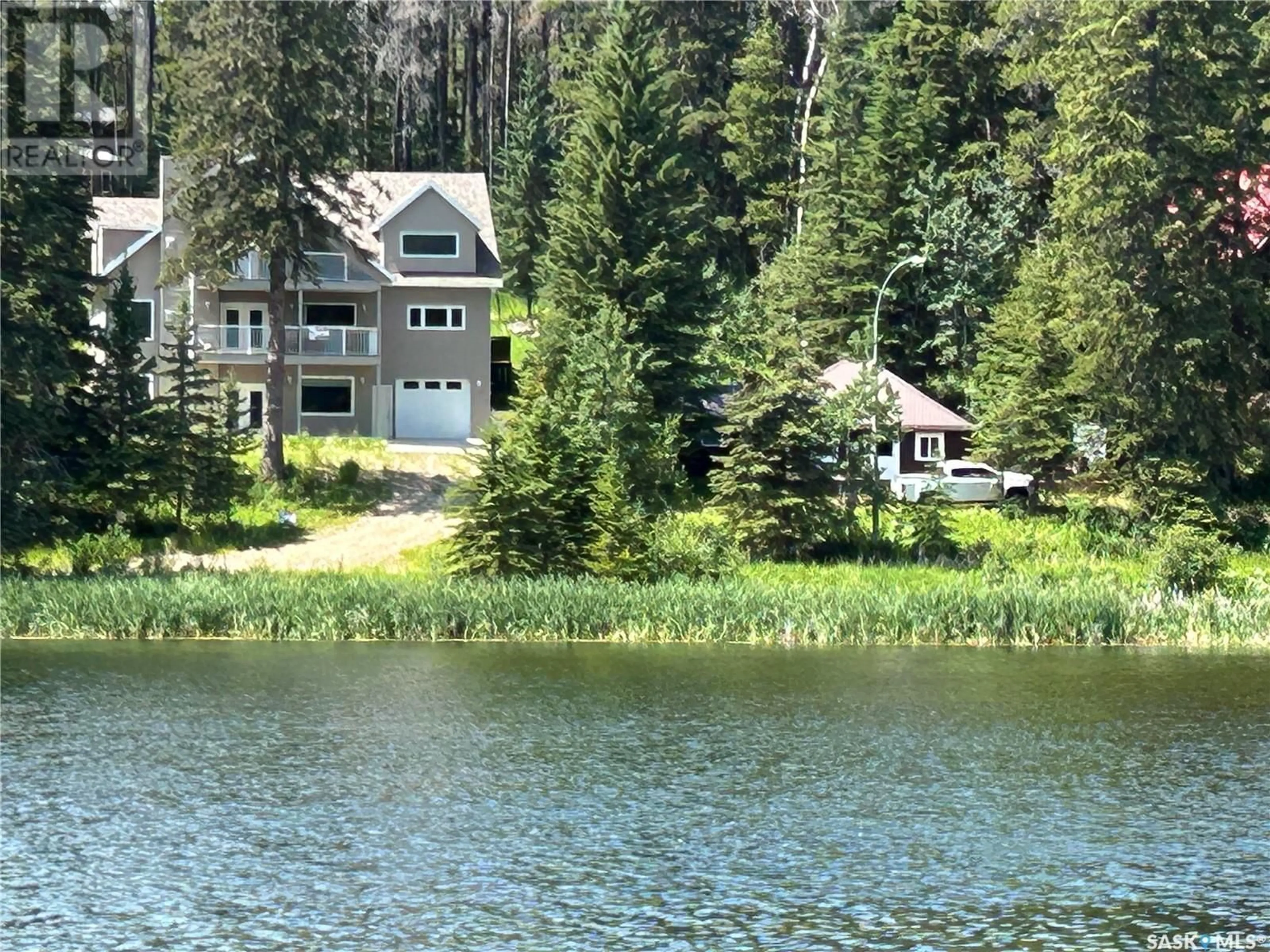 A pic from outside/outdoor area/front of a property/back of a property/a pic from drone, water/lake/river/ocean view for 209 BEN NEVIS DRIVE, Cypress Hills Provincial Park Saskatchewan S0N1N0