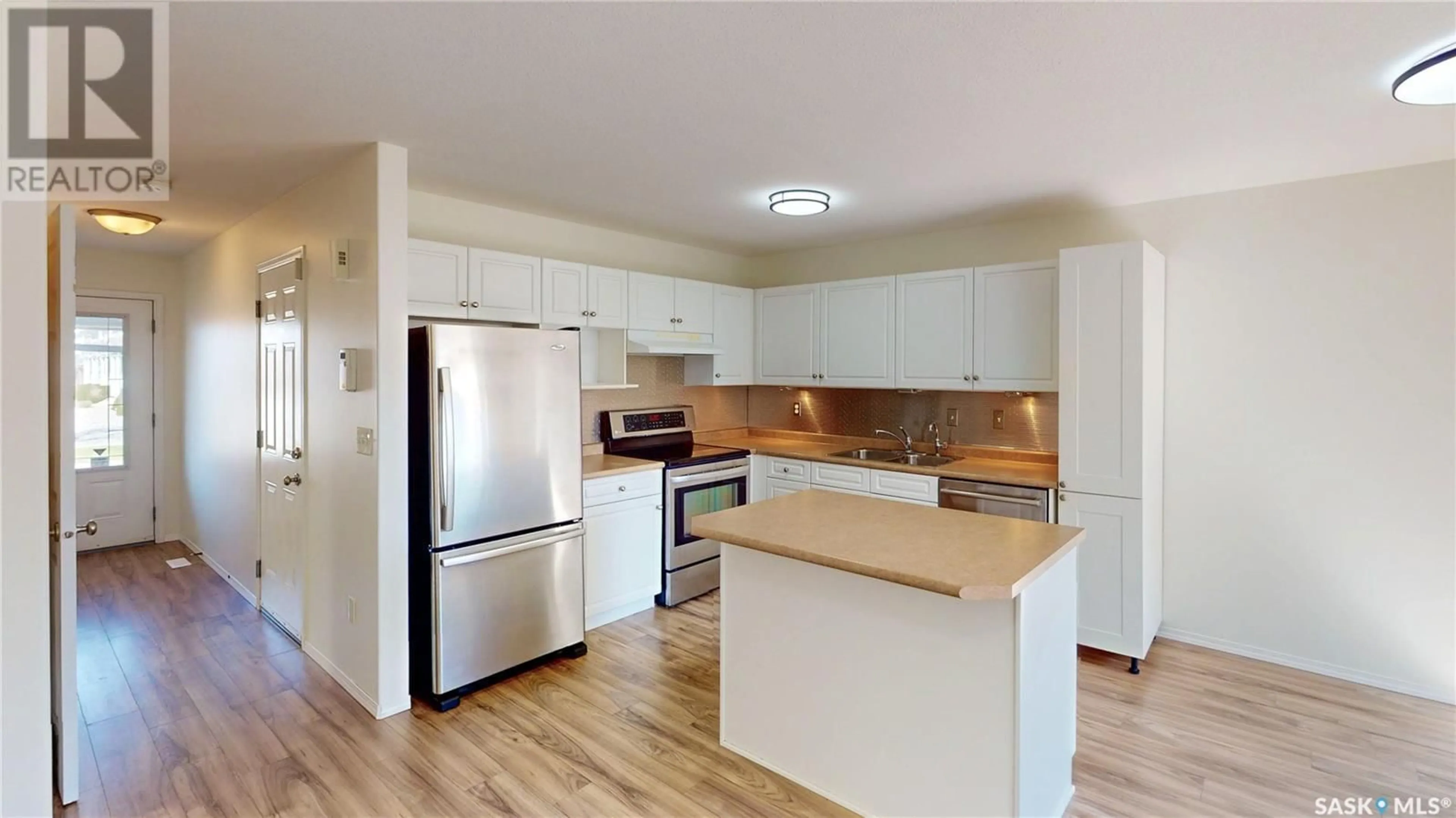 Standard kitchen, wood/laminate floor for 21 - 4901 CHILD AVENUE, Regina Saskatchewan S4X4T8