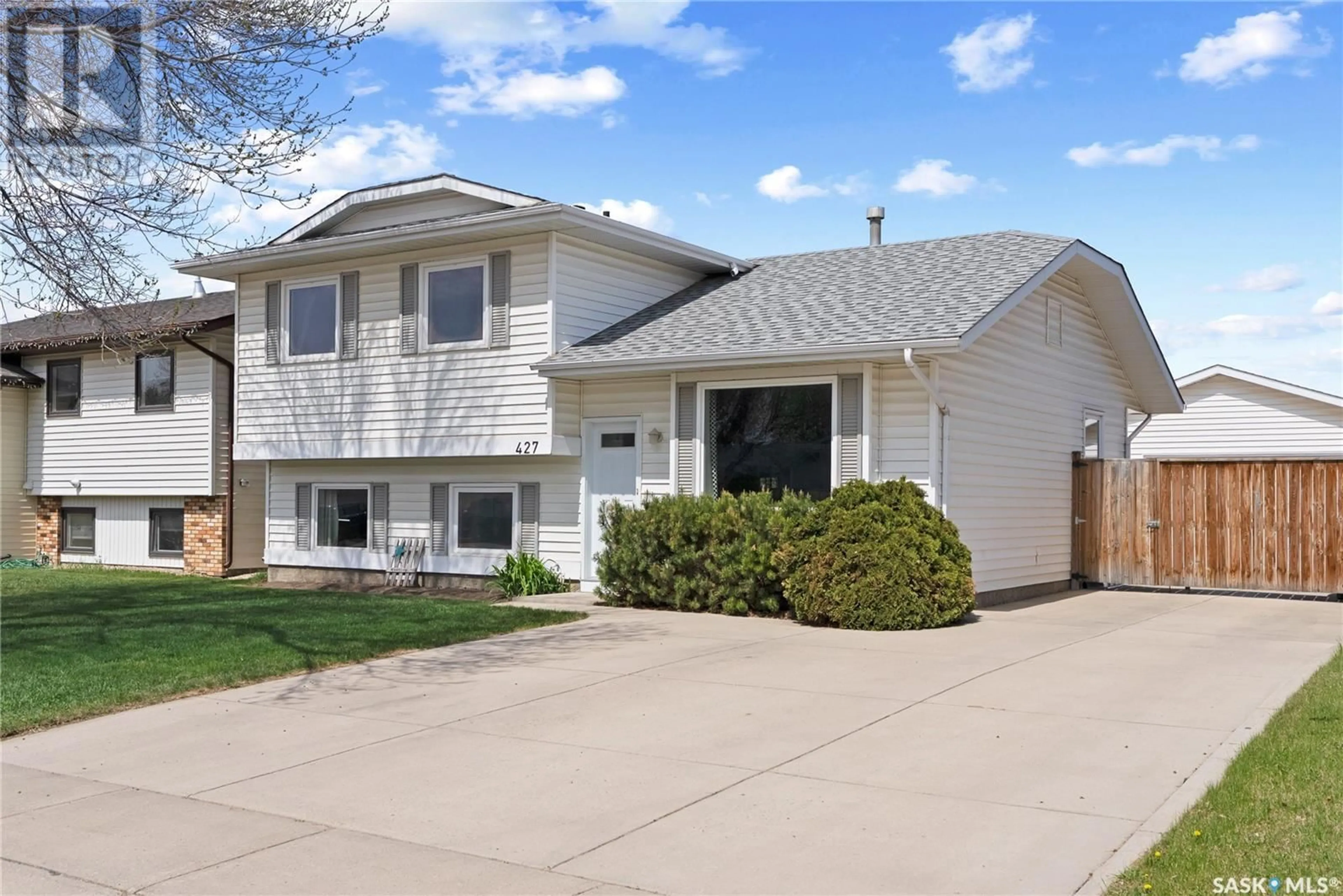 Home with vinyl exterior material, street for 427 GARVIE ROAD, Saskatoon Saskatchewan S7S1A2