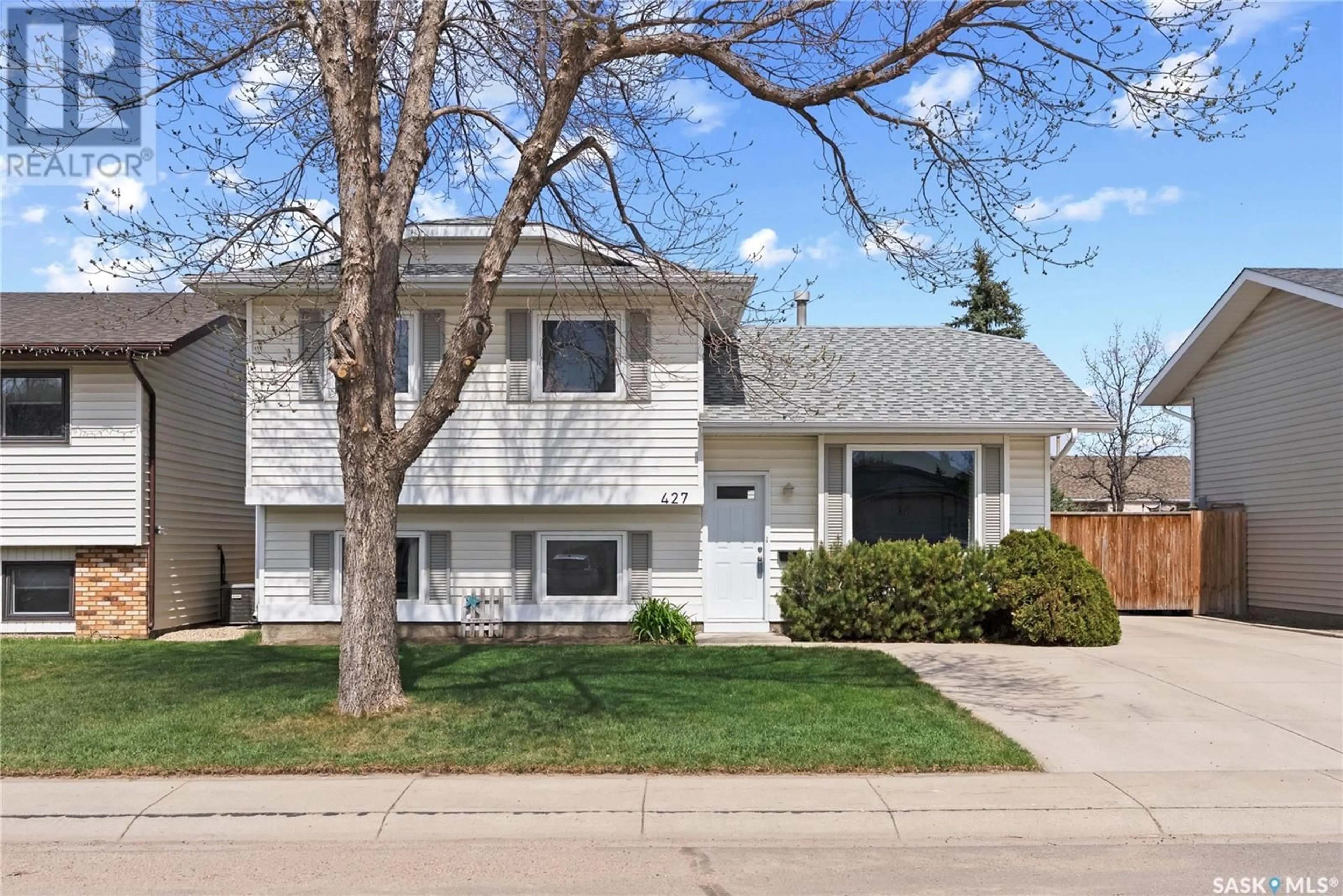 Home with vinyl exterior material, street for 427 GARVIE ROAD, Saskatoon Saskatchewan S7S1A2