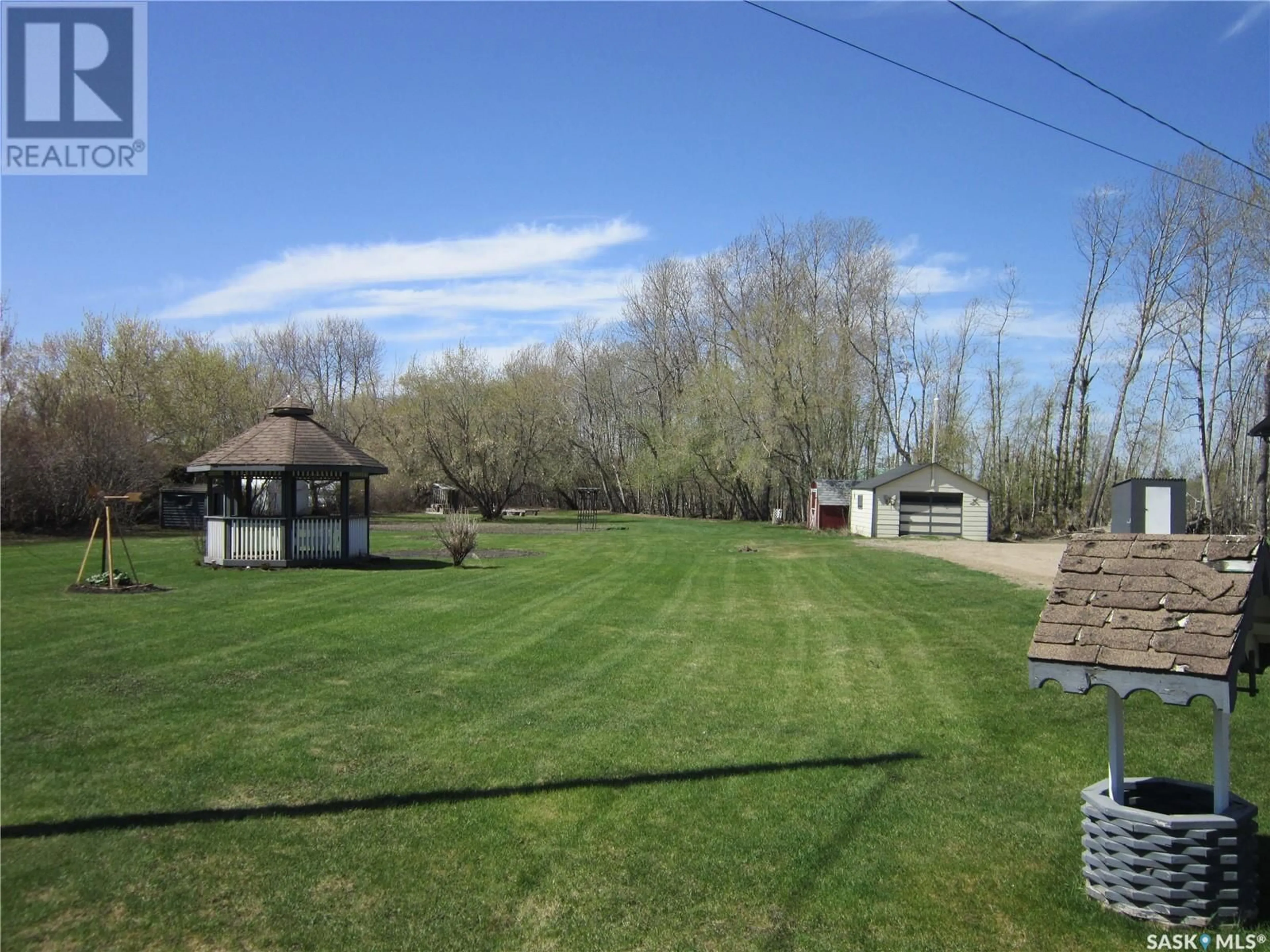 A pic from outside/outdoor area/front of a property/back of a property/a pic from drone, water/lake/river/ocean view for 507-509 PARKDALE STREET, Carrot River Saskatchewan S0E0L0