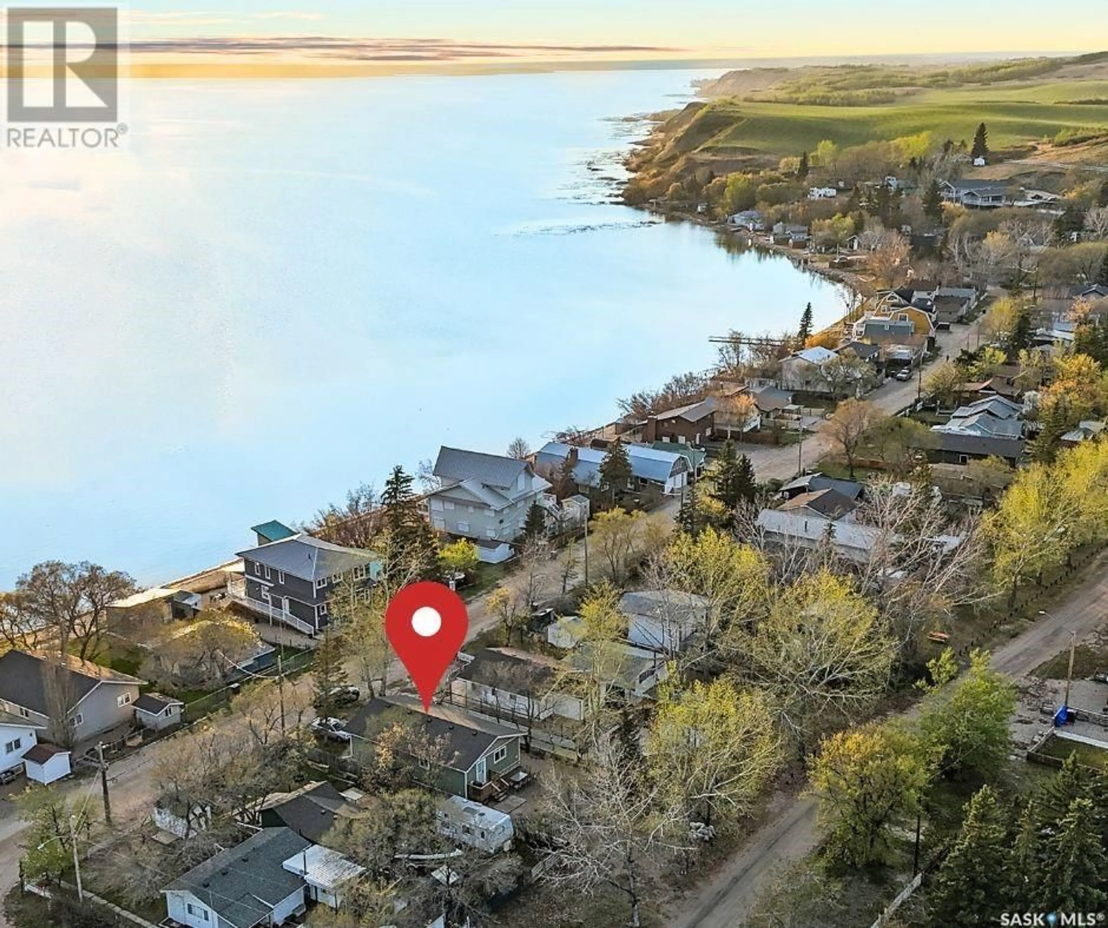 A pic from outside/outdoor area/front of a property/back of a property/a pic from drone, water/lake/river/ocean view for 972 ALFRED CRESCENT, Cochin Saskatchewan S0M0L0