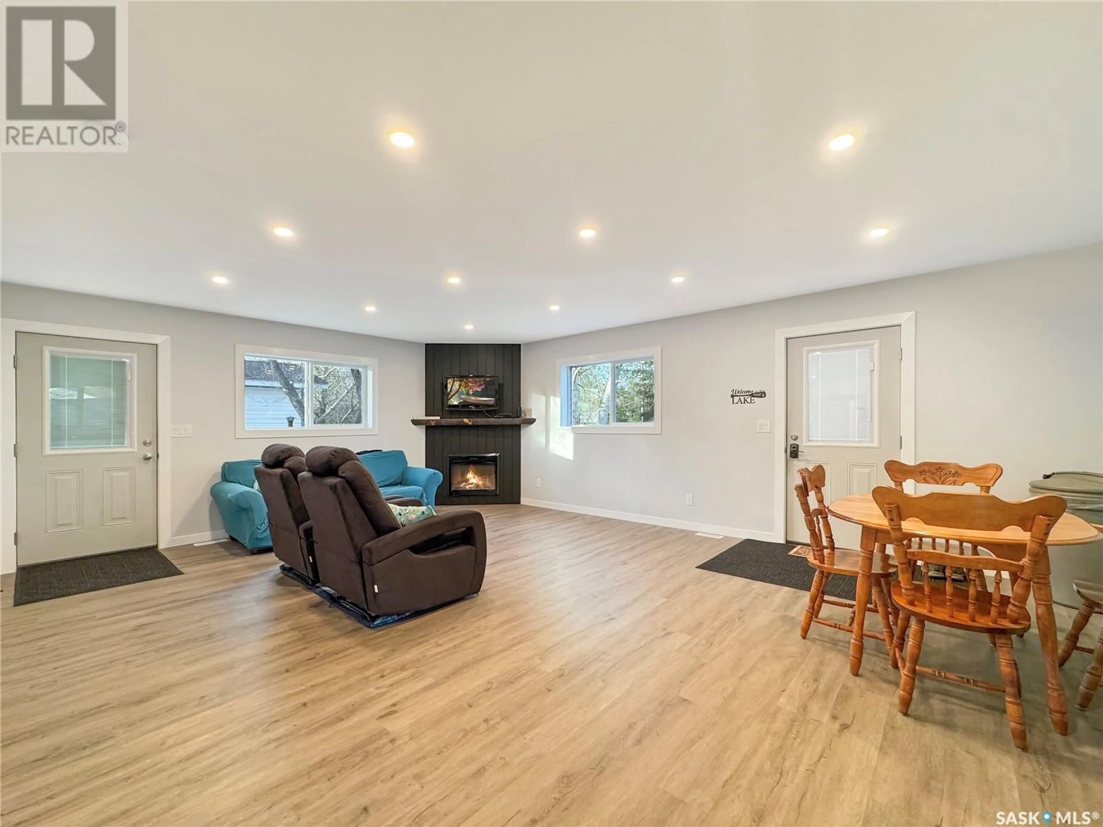 Living room with furniture, wood/laminate floor for 972 ALFRED CRESCENT, Cochin Saskatchewan S0M0L0