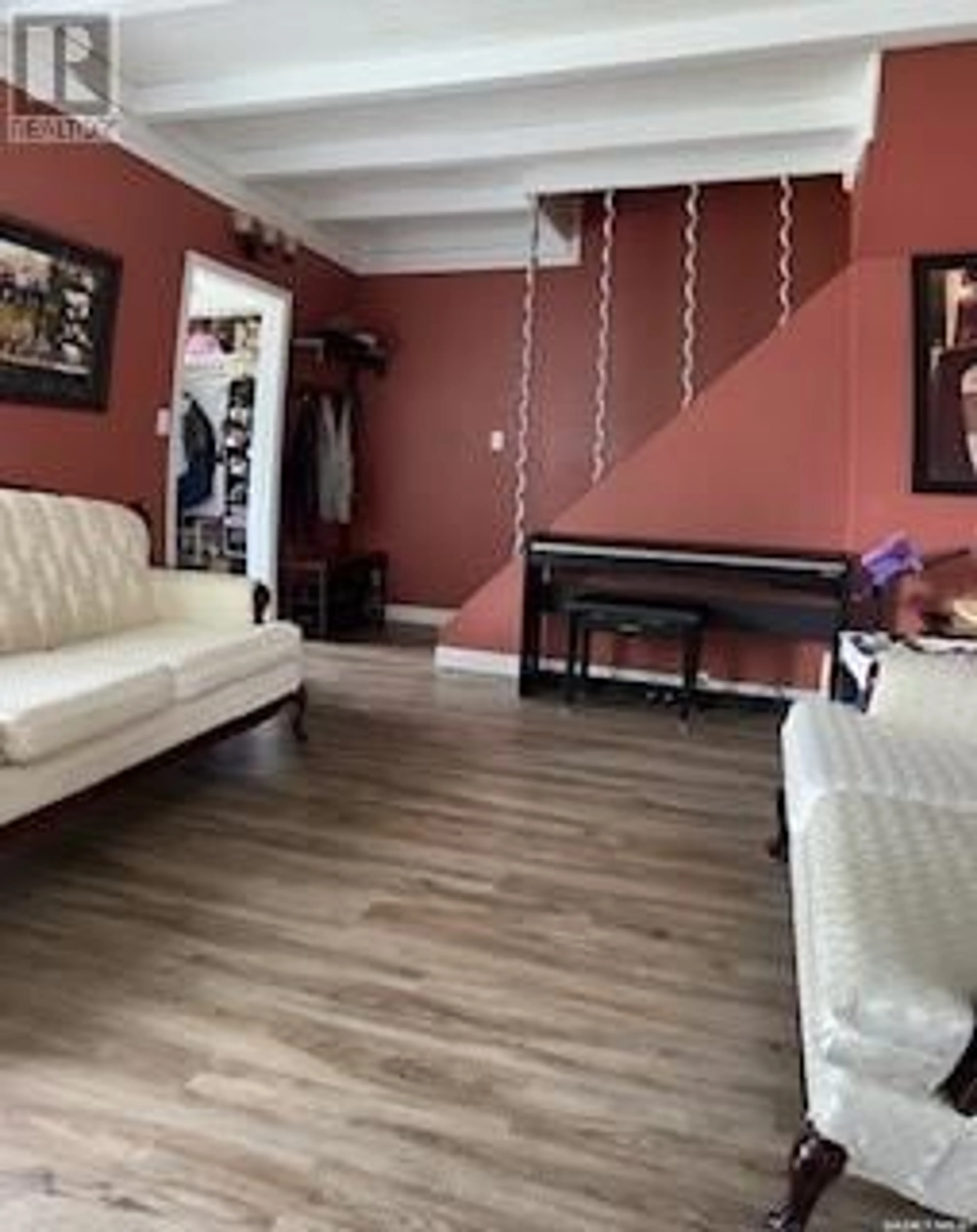 Living room with furniture, unknown for 1217 2ND STREET, Estevan Saskatchewan S4A0M1