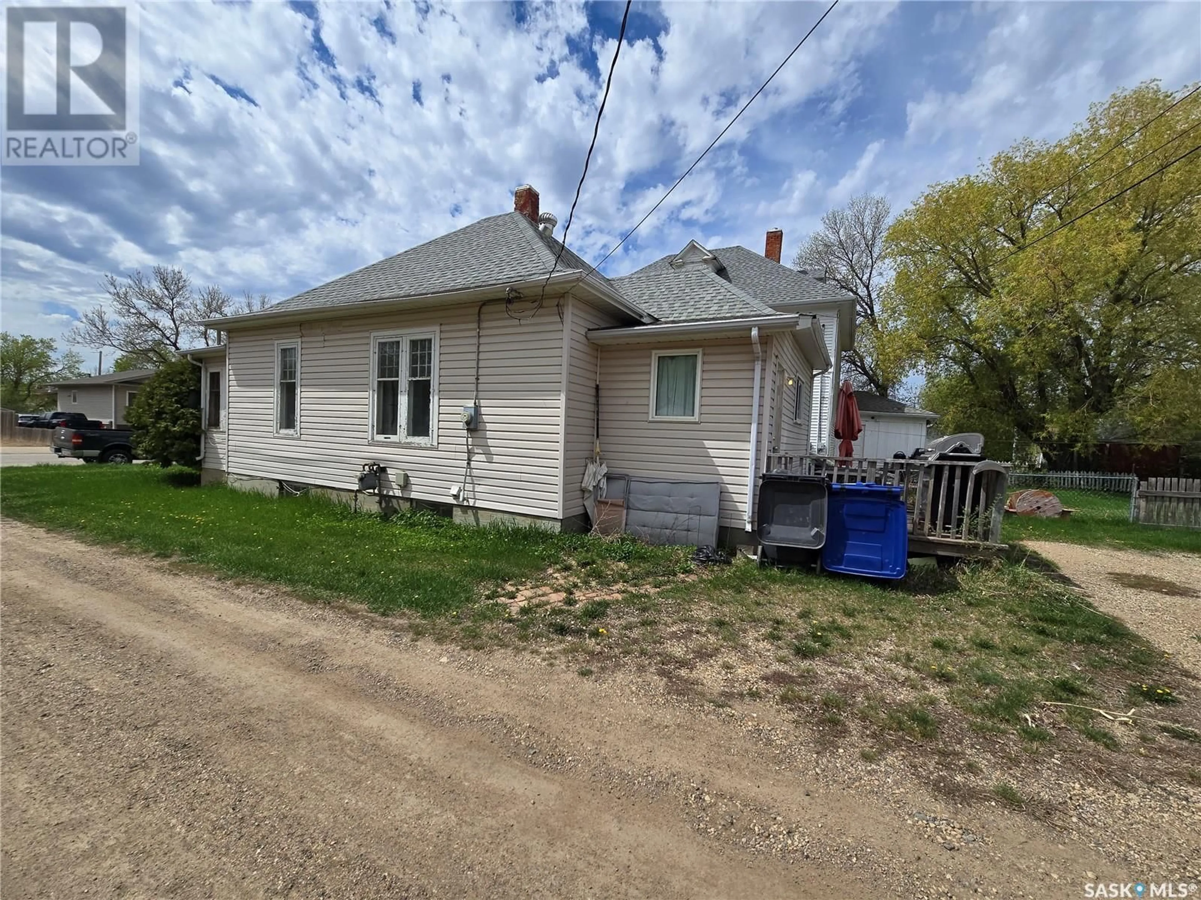 A pic from outside/outdoor area/front of a property/back of a property/a pic from drone, street for 9 PRAIRIE AVENUE, Weyburn Saskatchewan S4H0K9