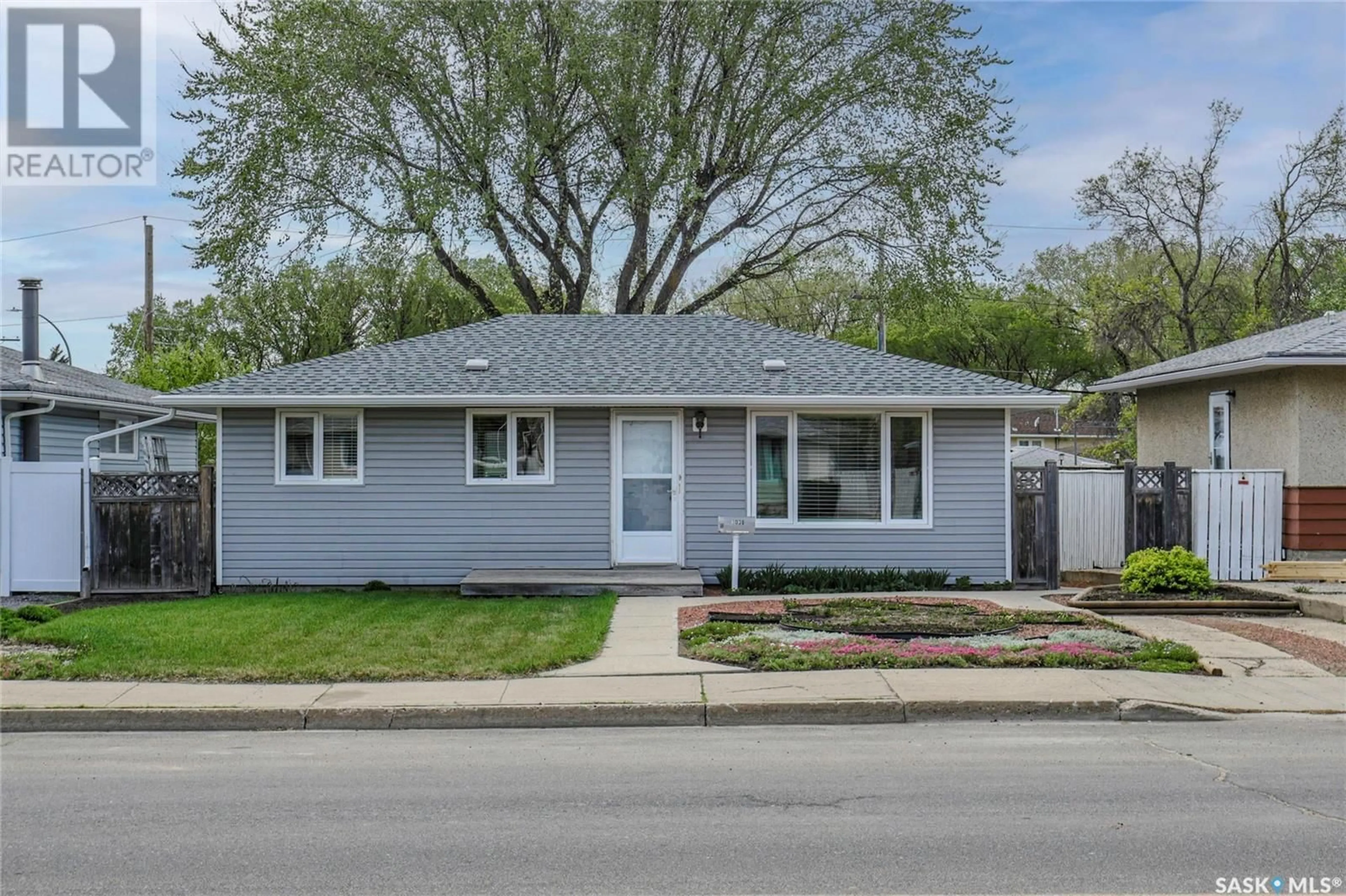 Home with vinyl exterior material, street for 1038 CAMPBELL STREET, Regina Saskatchewan S4T5P4