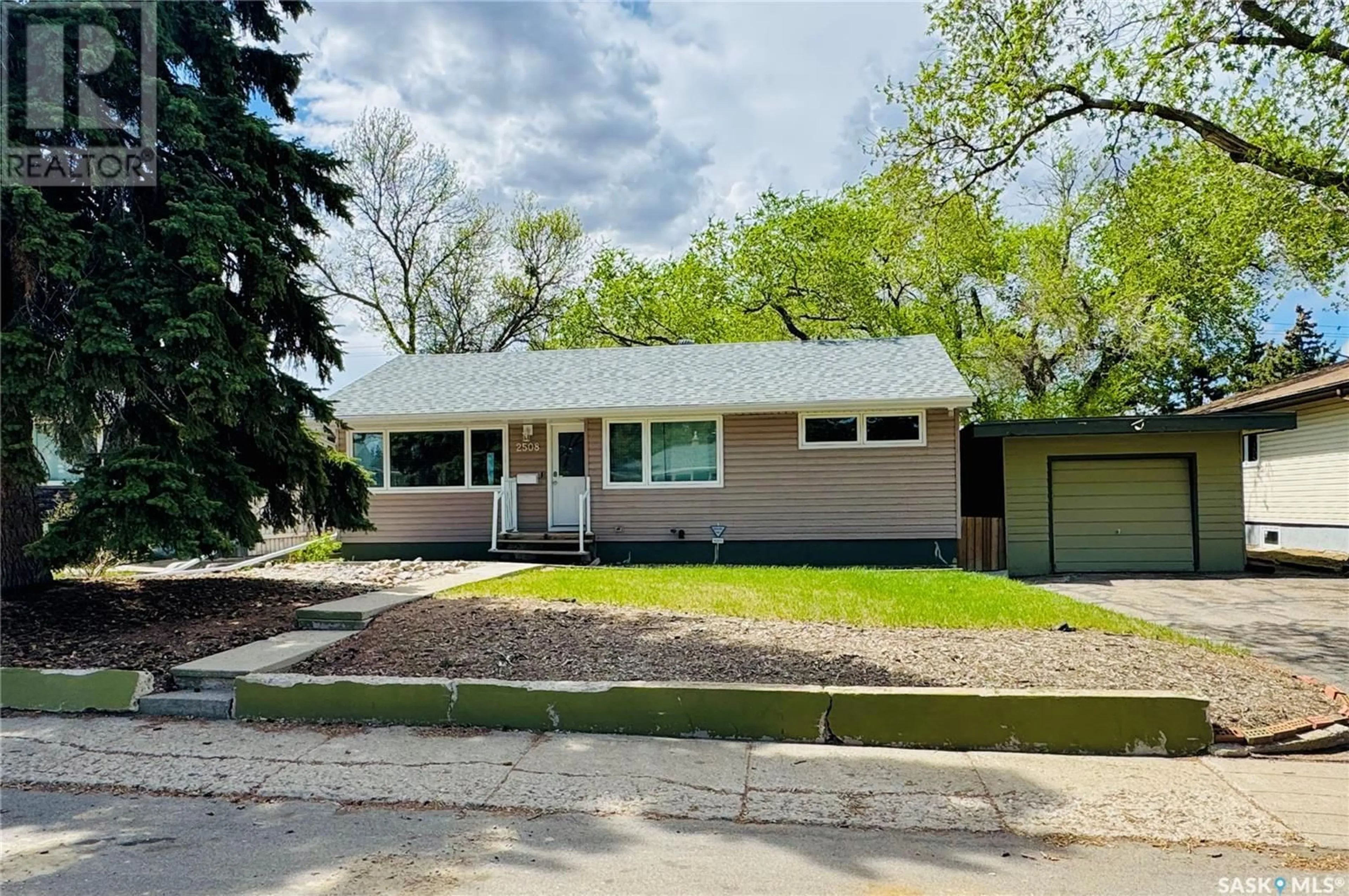 Home with vinyl exterior material, street for 2508 EDWARD STREET, Regina Saskatchewan S4S0M8