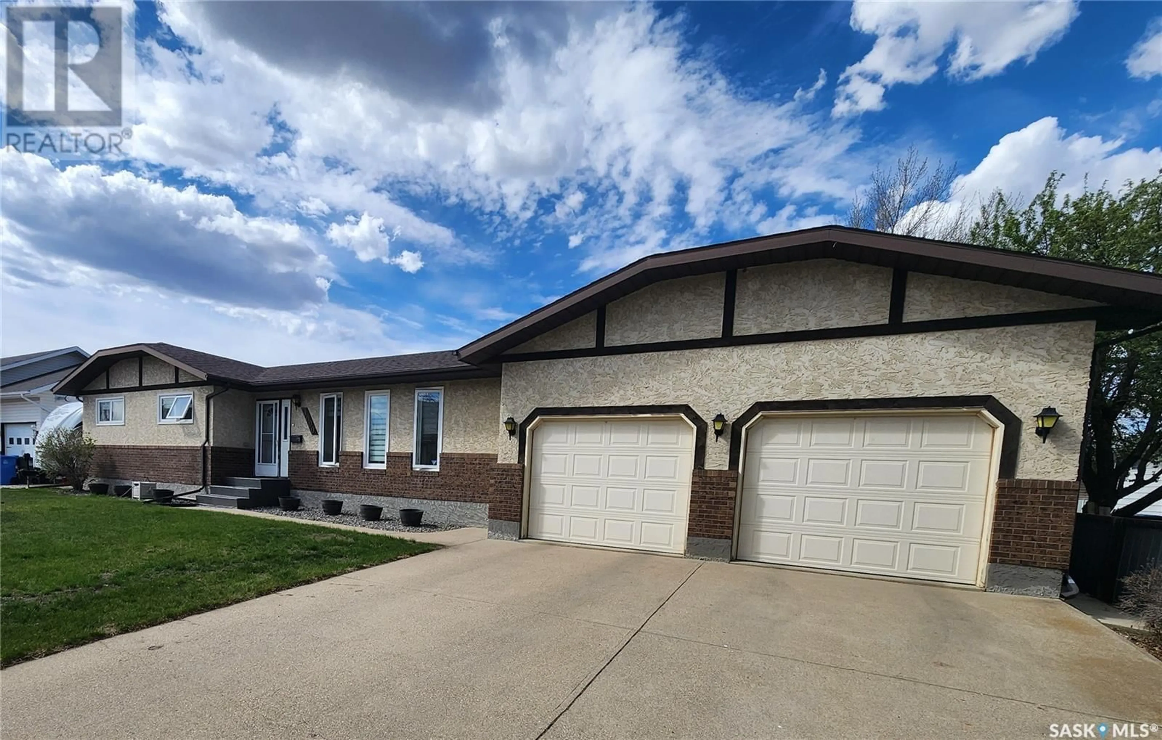 Home with vinyl exterior material, street for 1600 WAHLMEIER DRIVE, Estevan Saskatchewan S4A2L4