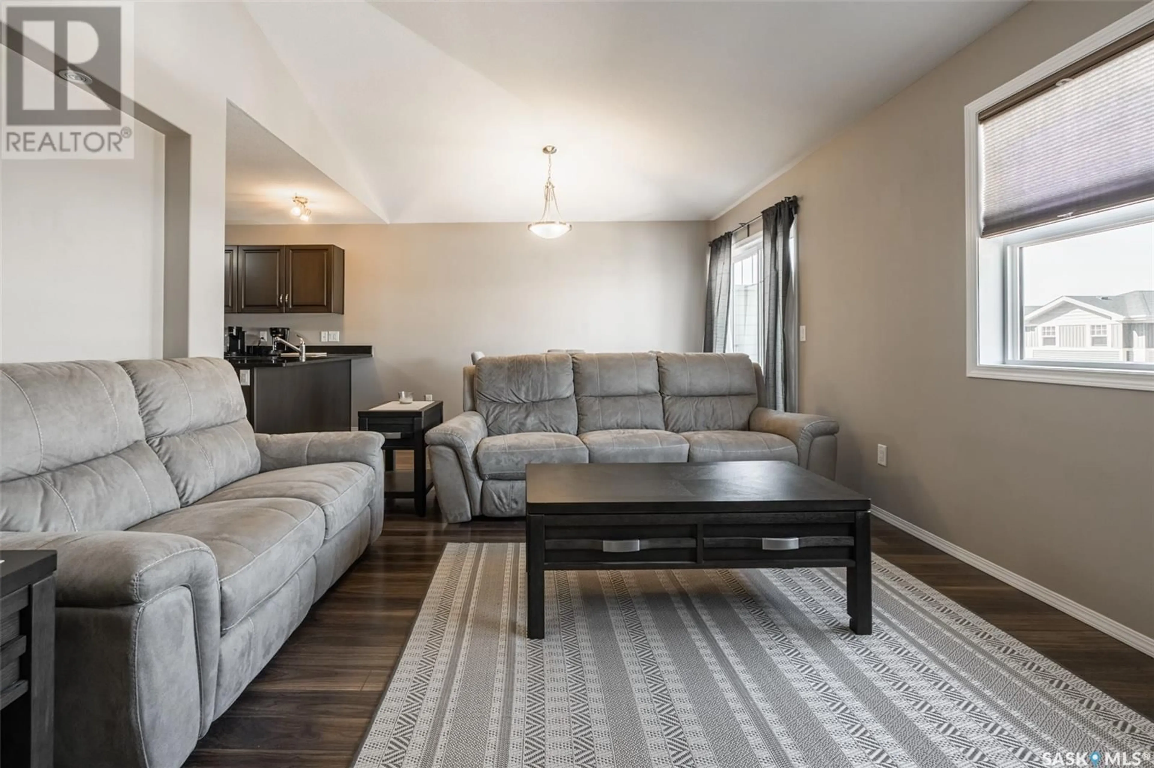 Living room with furniture, unknown for 100 - 215 CHAPARRAL BOULEVARD, Martensville Saskatchewan S0K2T2