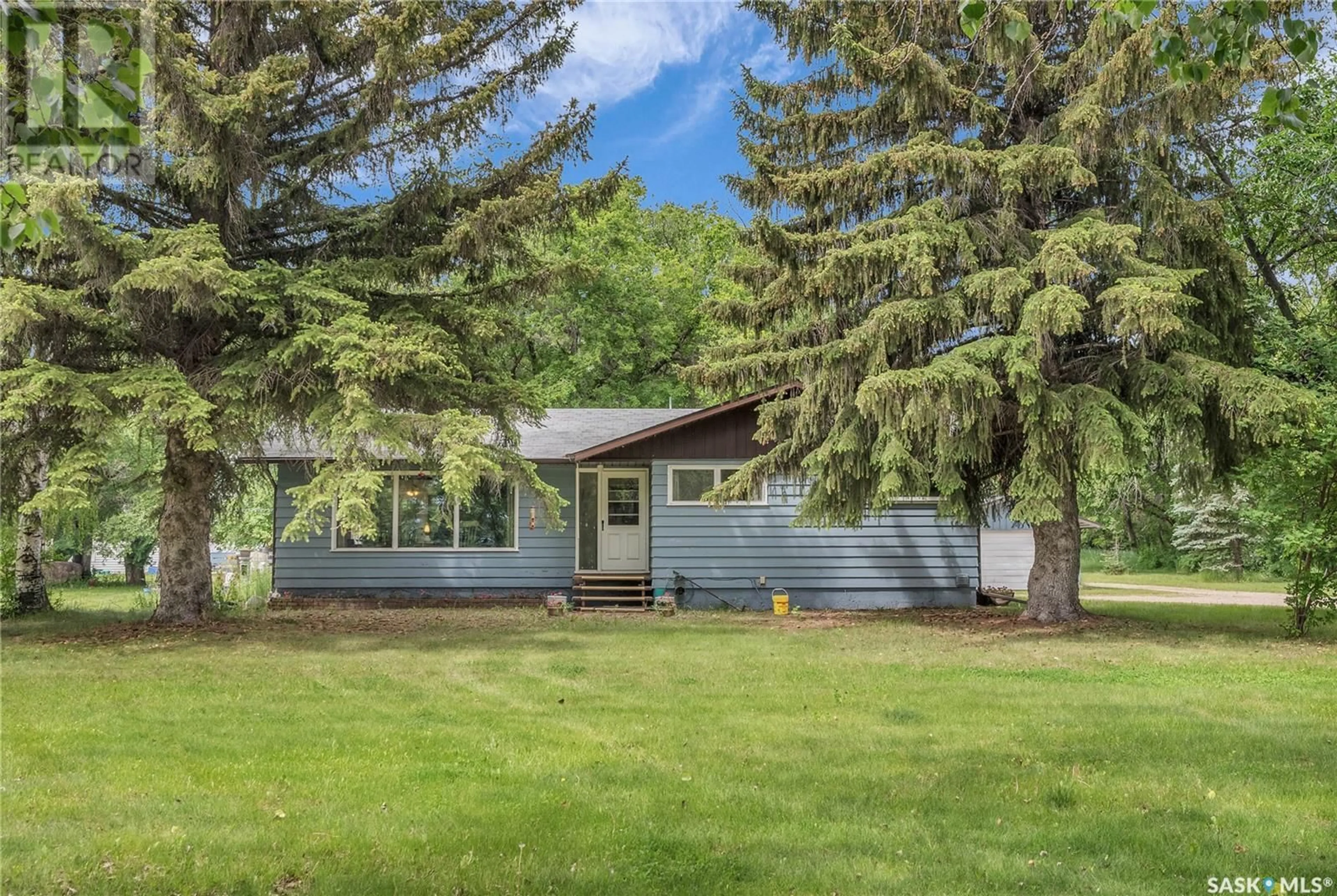 Home with vinyl exterior material, street for 2 IMPERIAL ACREAGE HIGHWAY, Big Arm Rm No. 251 Saskatchewan S0G2J0