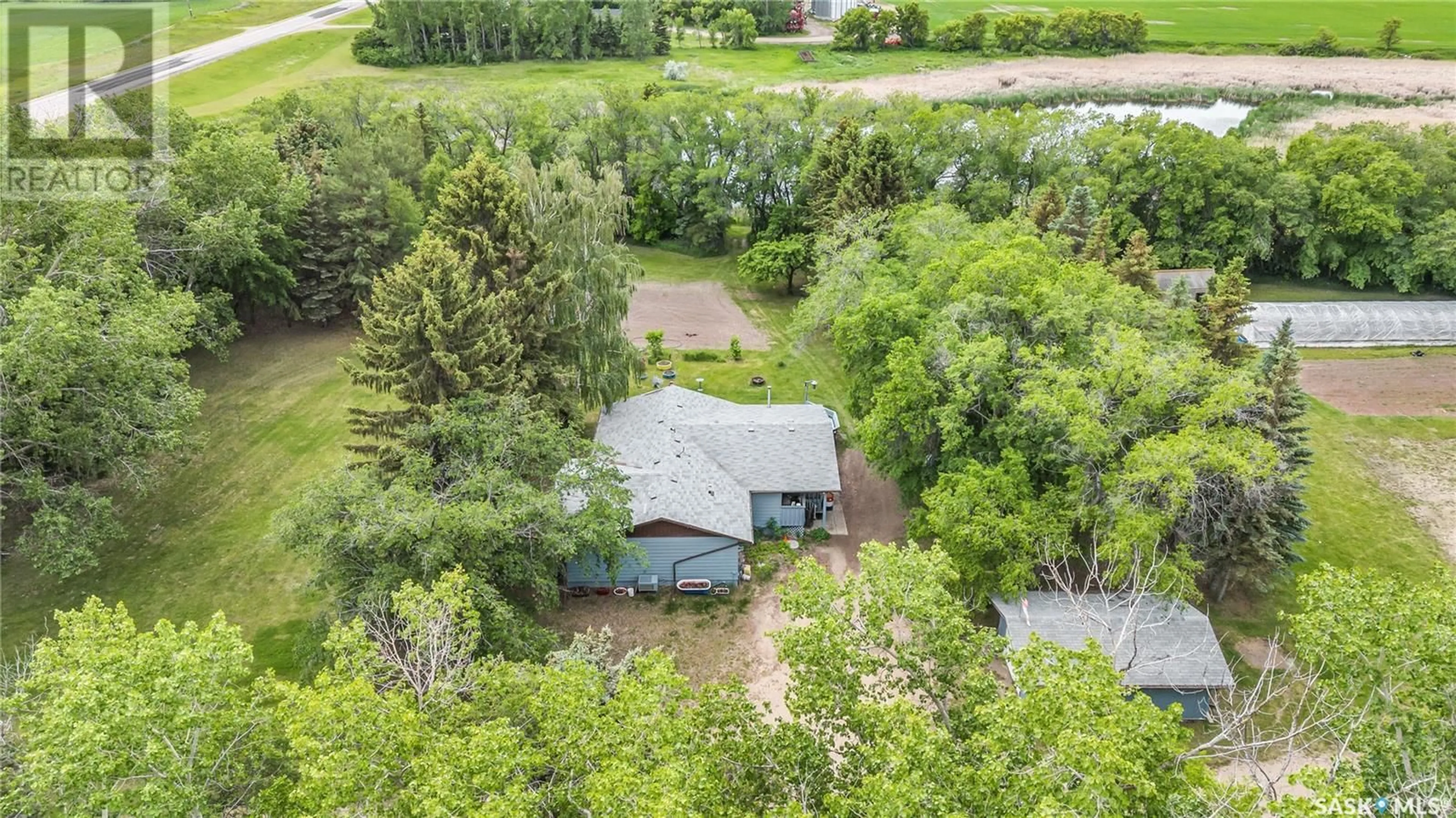 A pic from outside/outdoor area/front of a property/back of a property/a pic from drone, forest/trees view for 2 IMPERIAL ACREAGE HIGHWAY, Big Arm Rm No. 251 Saskatchewan S0G2J0