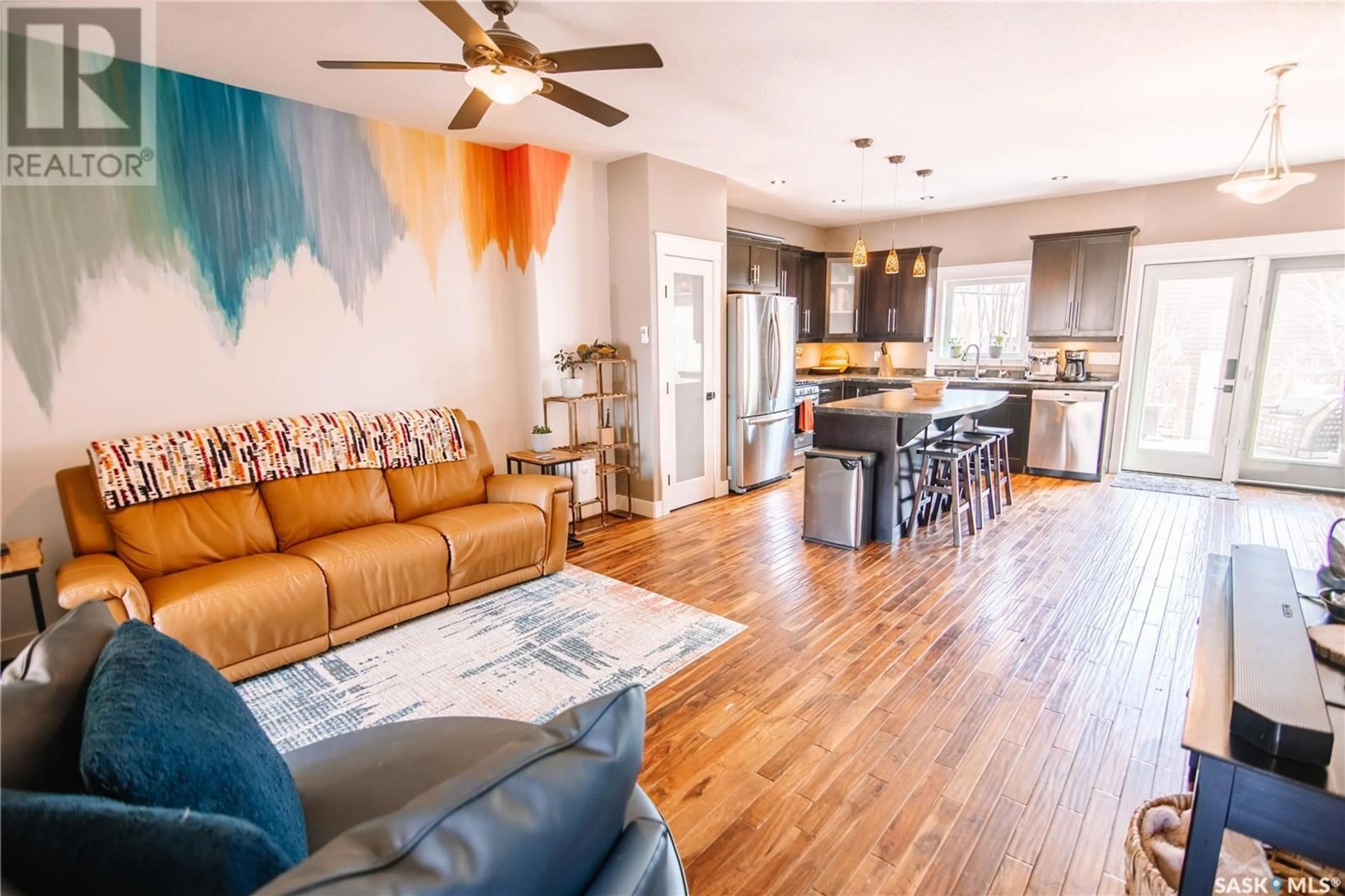 Open concept kitchen, wood/laminate floor for 1933 ATKINSON STREET, Regina Saskatchewan S4N3W6