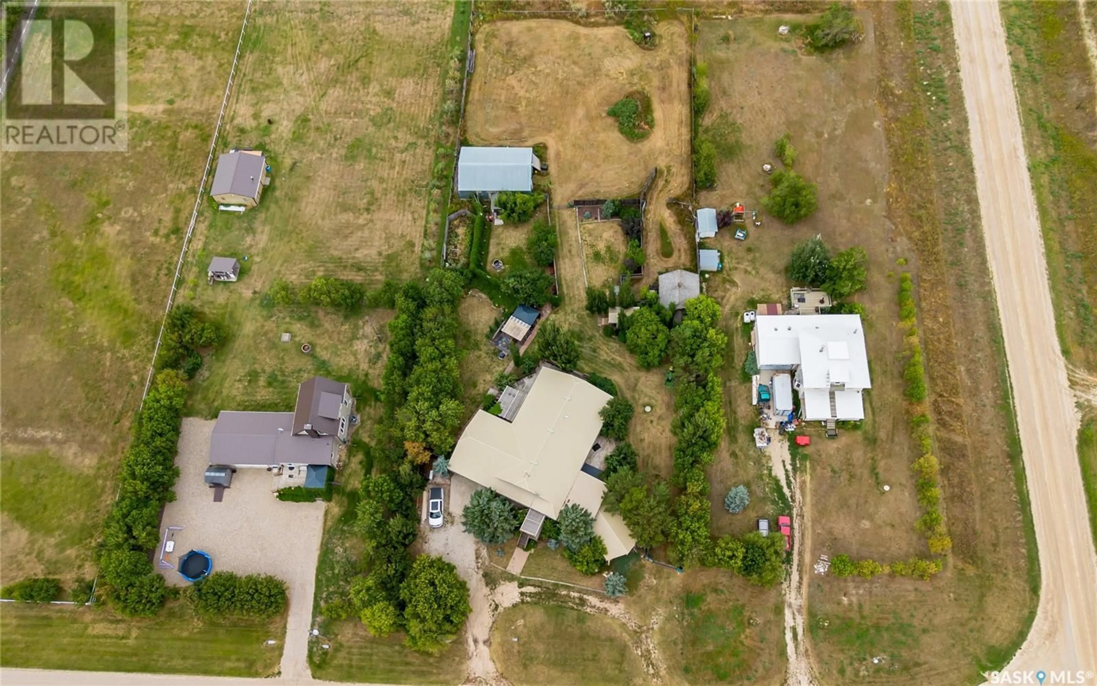 A pic from outside/outdoor area/front of a property/back of a property/a pic from drone, street for 3 COLONY LN, Lajord Rm No. 128 Saskatchewan S4L5B1