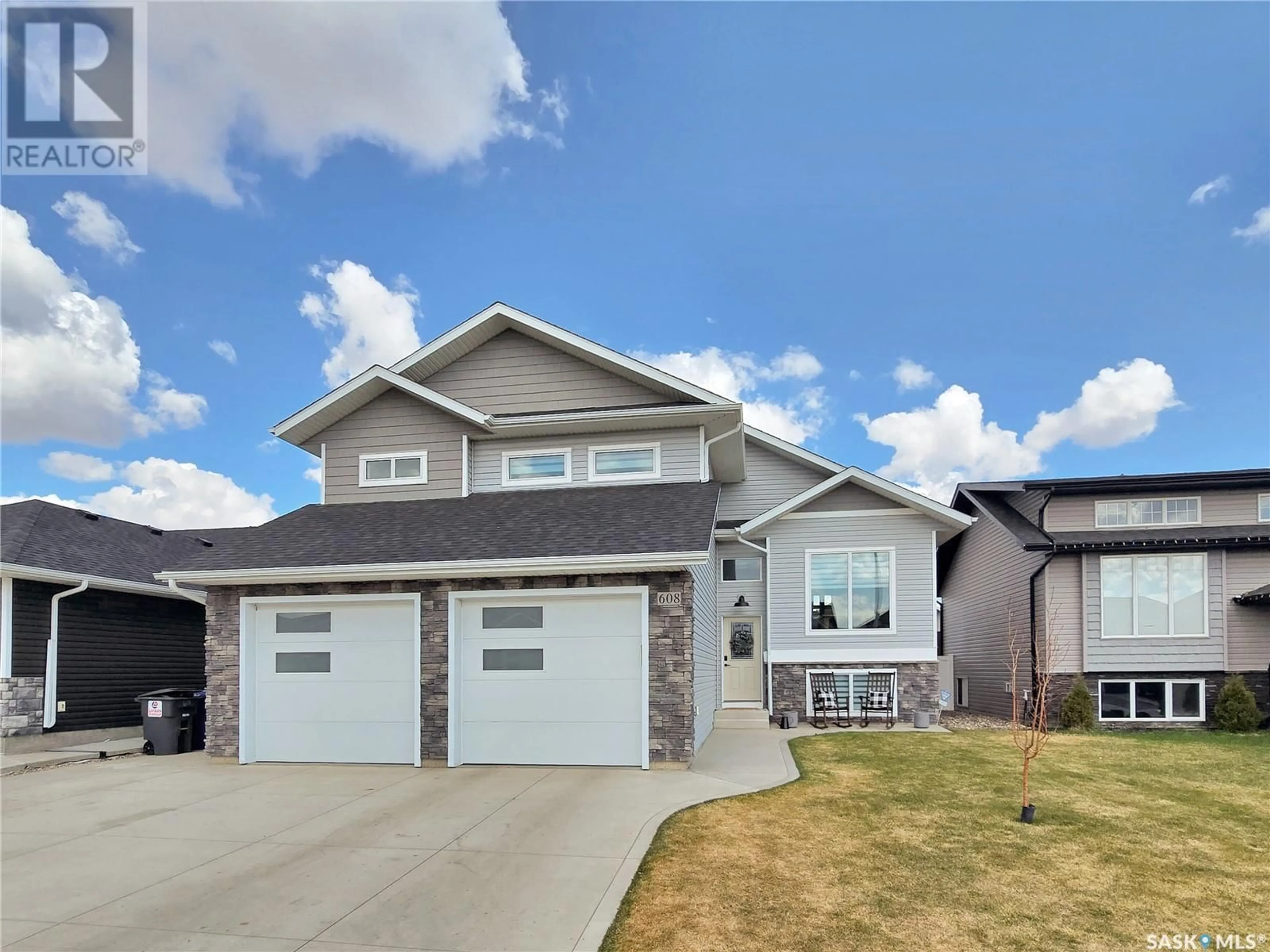Home with vinyl exterior material, street for 608 PEBBLE BEACH BOULEVARD, Warman Saskatchewan S0K4S4