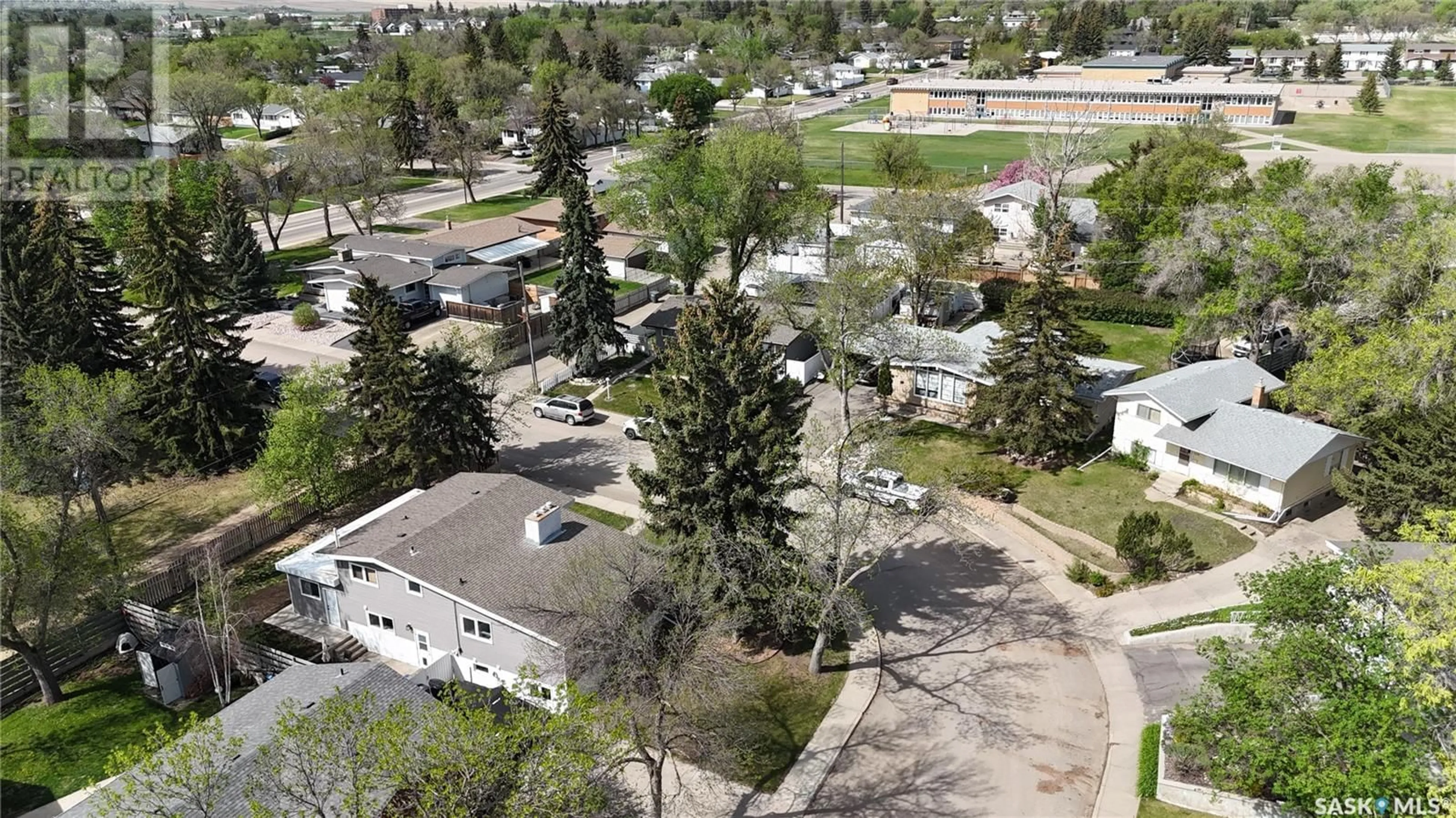 A pic from outside/outdoor area/front of a property/back of a property/a pic from drone, street for 1206 IRWIN DRIVE, Swift Current Saskatchewan S9H1Z7