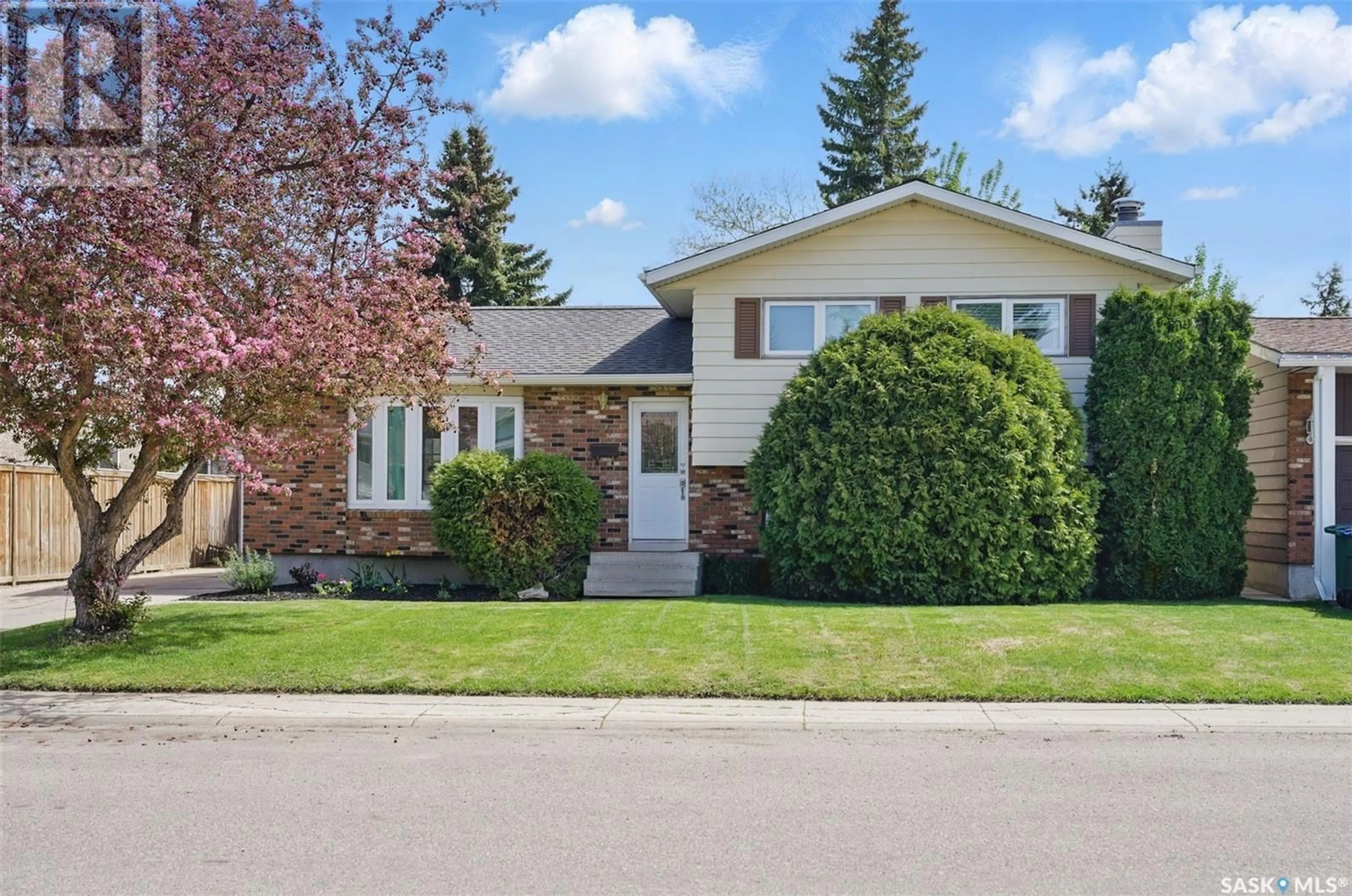 Home with vinyl exterior material, street for 14 SCHWAGER CRESCENT, Saskatoon Saskatchewan S7H5C2