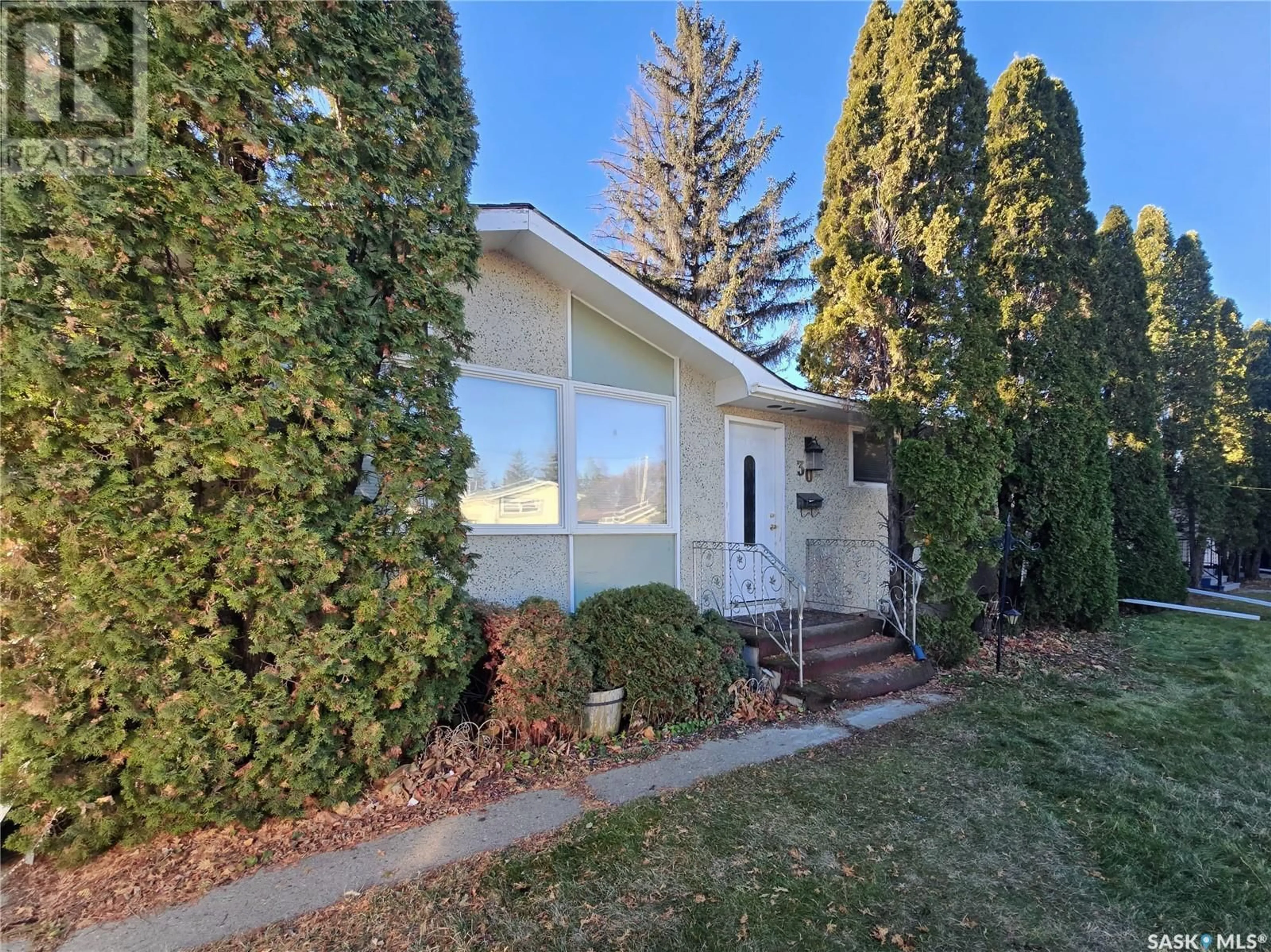 Home with vinyl exterior material, street for 30 LINDSAY DRIVE, Saskatoon Saskatchewan S7H3E1
