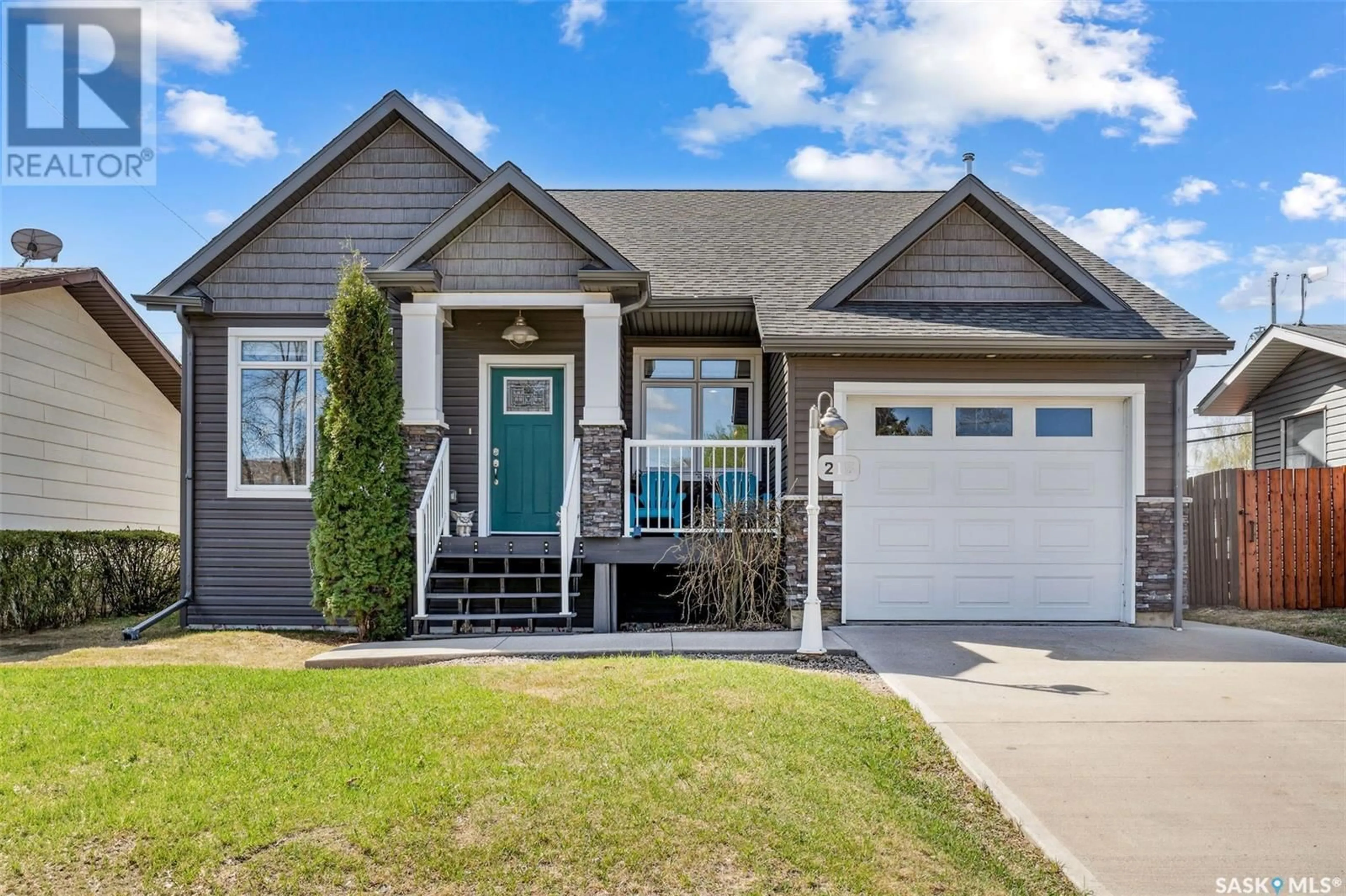 Home with vinyl exterior material, street for 215 2ND AVENUE, Shellbrook Saskatchewan S0J2E0