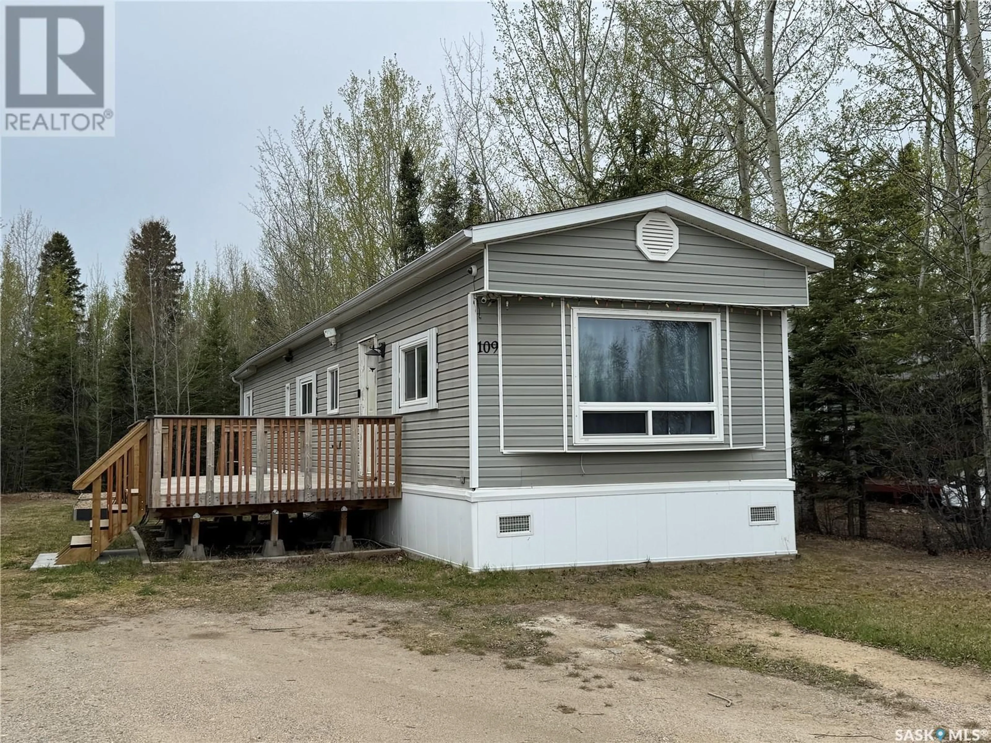 Home with vinyl exterior material, street for 109 VICKERS DRIVE, Air Ronge Saskatchewan S0J3G0