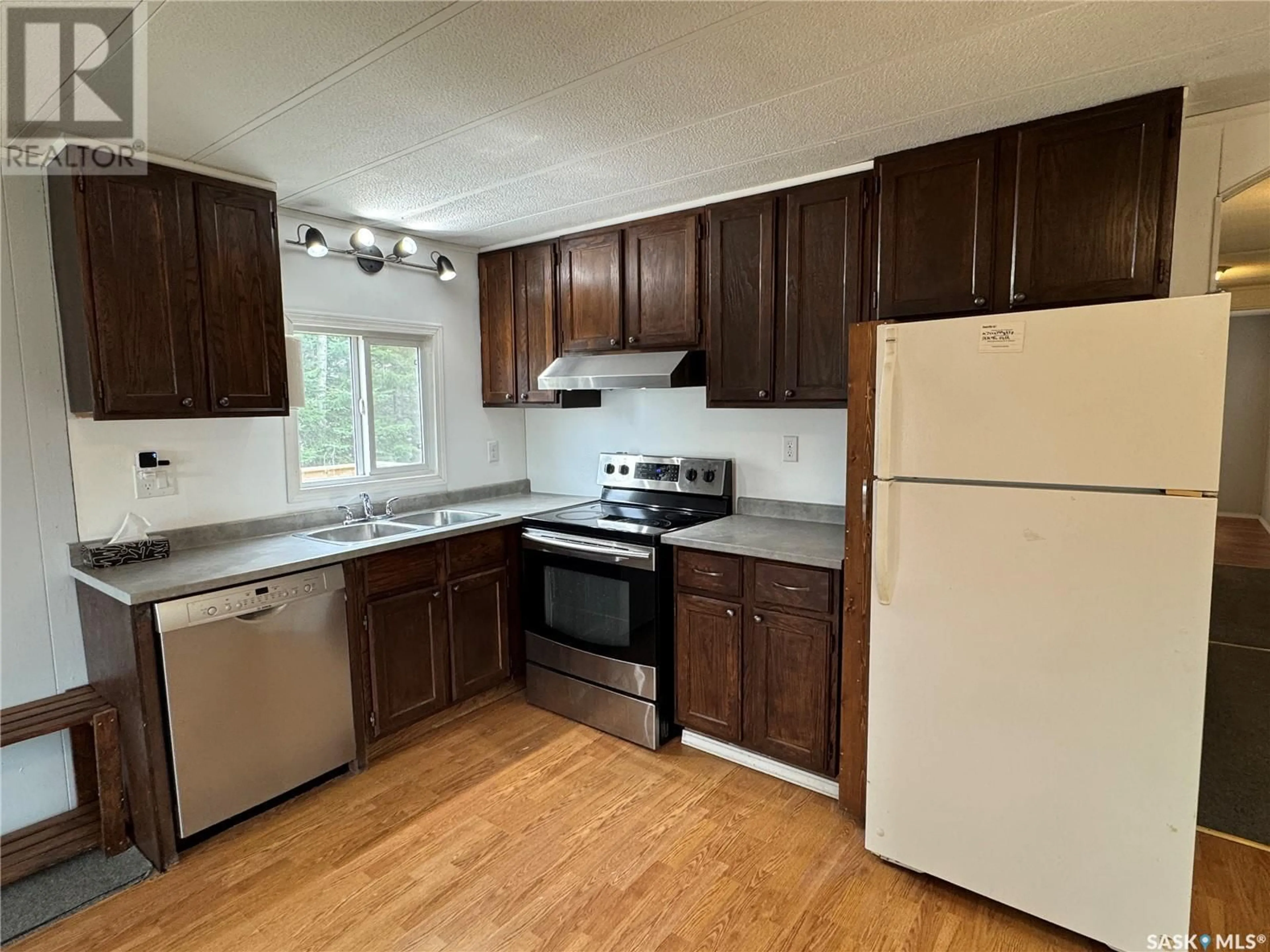 Standard kitchen, wood/laminate floor for 109 VICKERS DRIVE, Air Ronge Saskatchewan S0J3G0