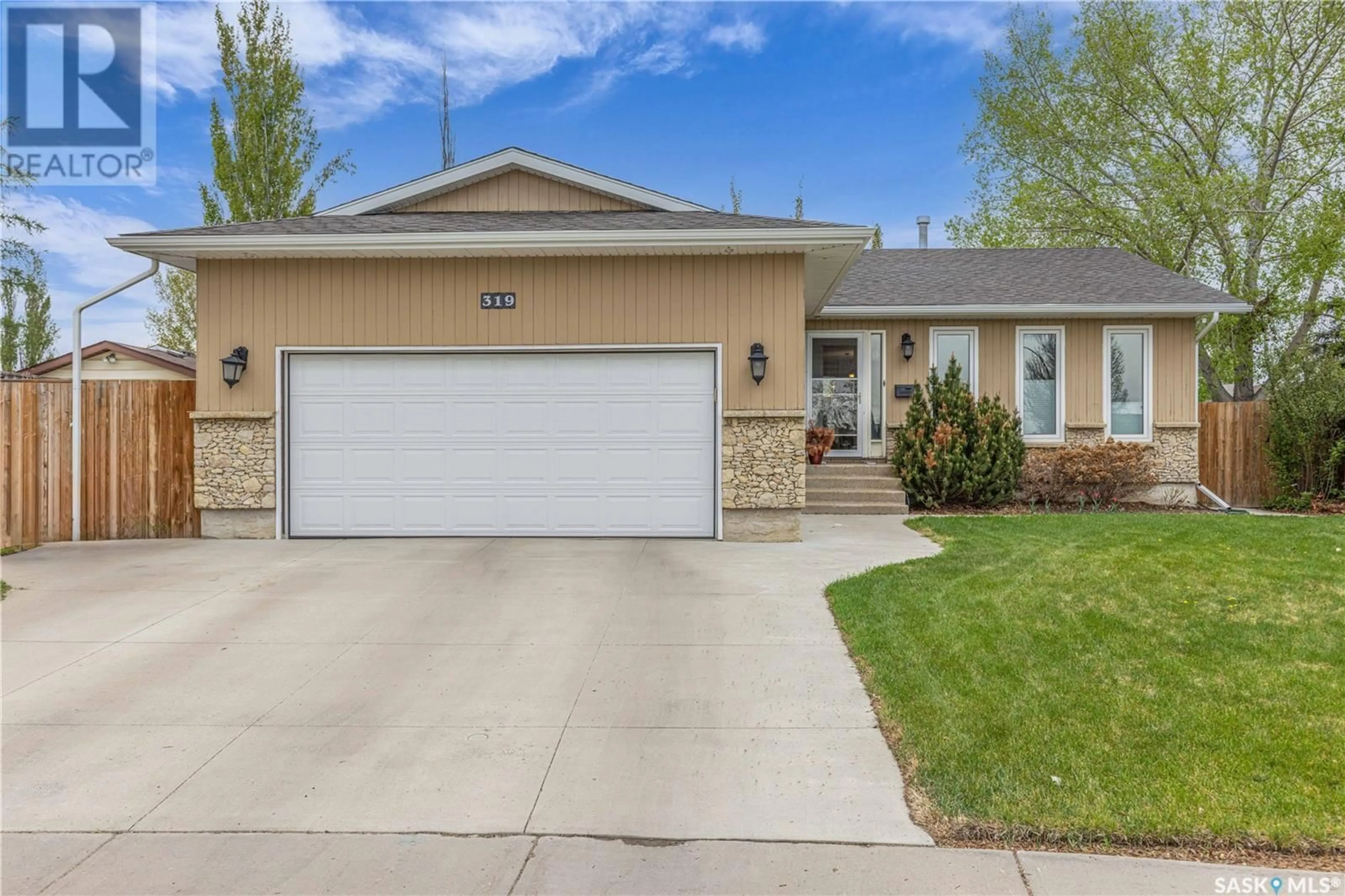 Home with vinyl exterior material, street for 319 ARMSTRONG WAY, Saskatoon Saskatchewan S7N3M8