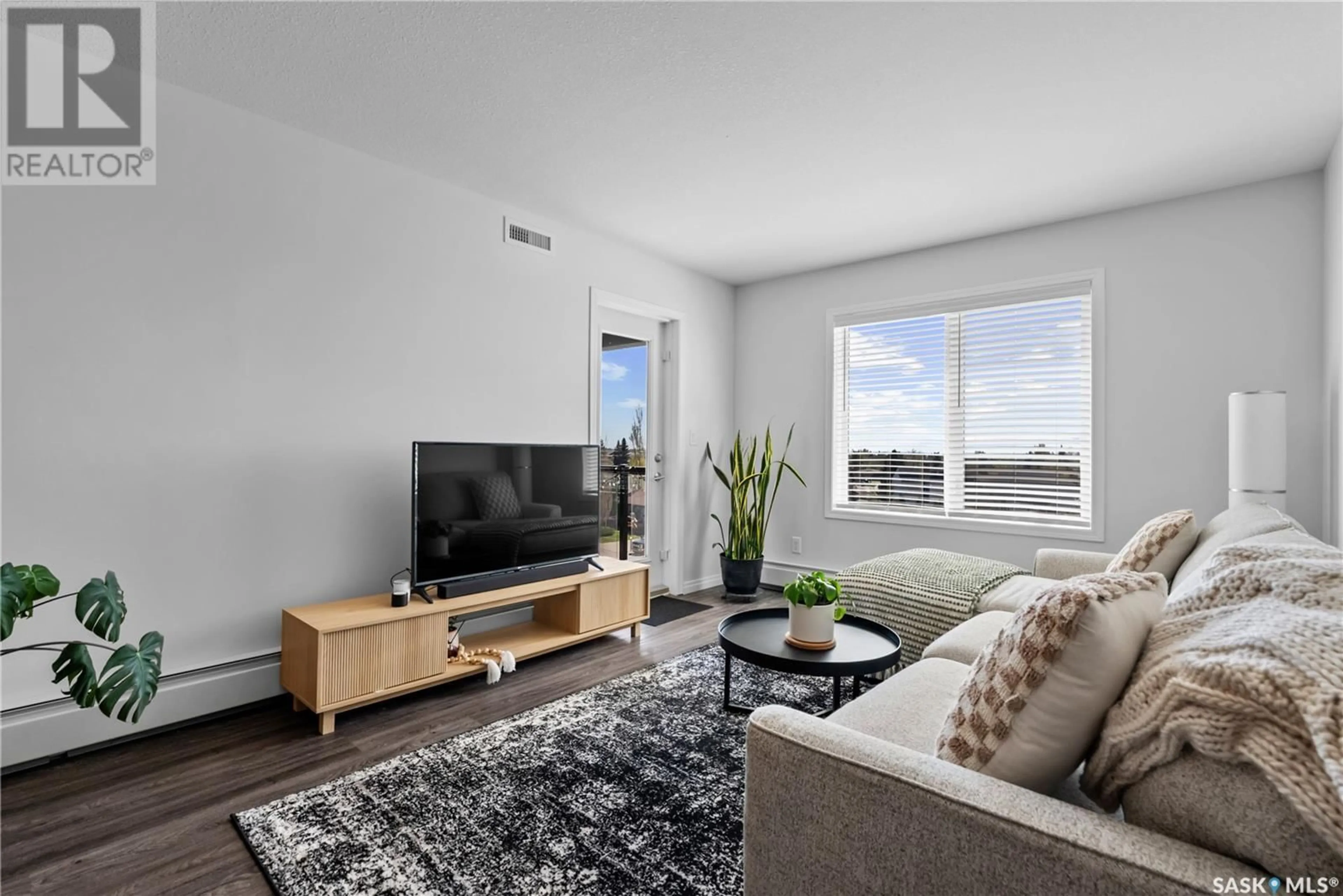 Living room with furniture, unknown for 405 - 2452 KILLDEER DRIVE, North Battleford Saskatchewan S9A3T5