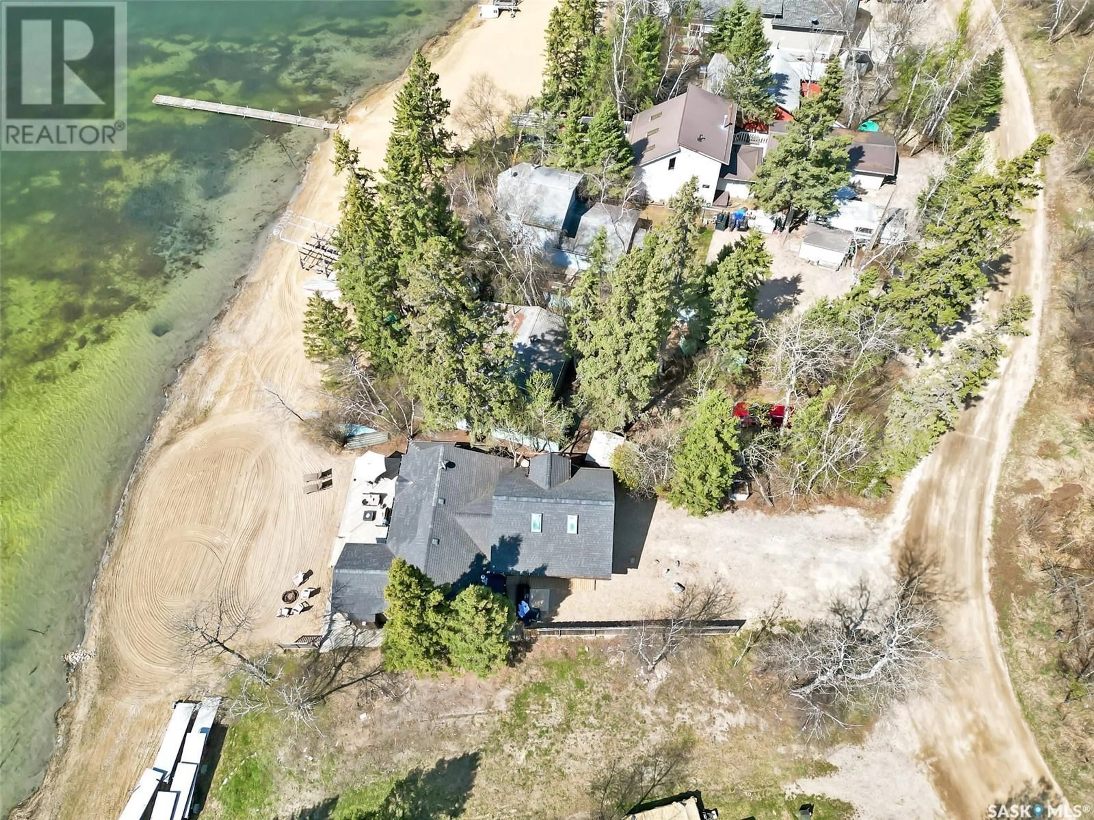 A pic from outside/outdoor area/front of a property/back of a property/a pic from drone, unknown for 113 JANICE PLACE, Emma Lake Saskatchewan S0J0N0