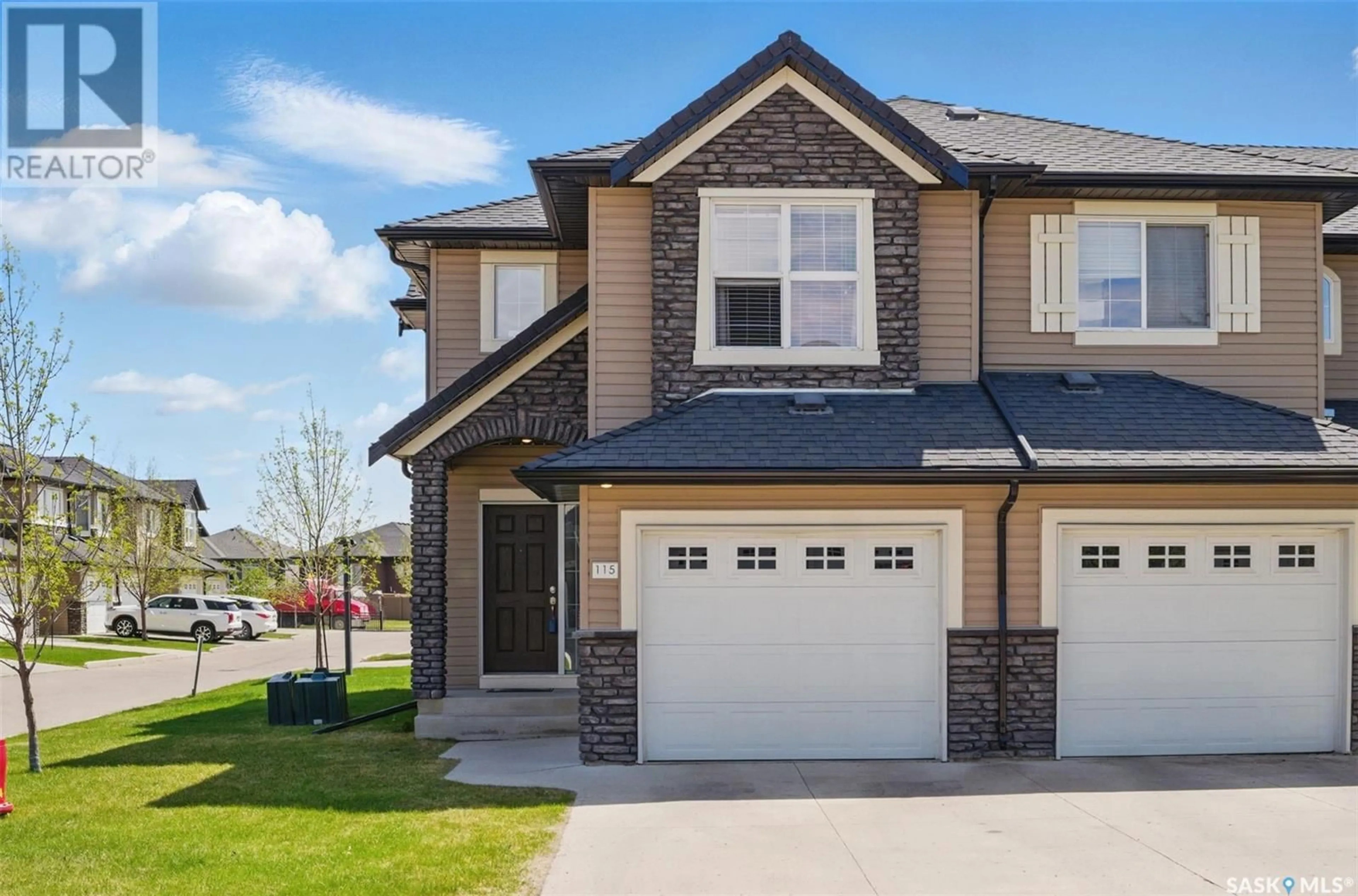 Home with brick exterior material, street for 410 - 115 LEDINGHAM WAY, Saskatoon Saskatchewan S7V0C4
