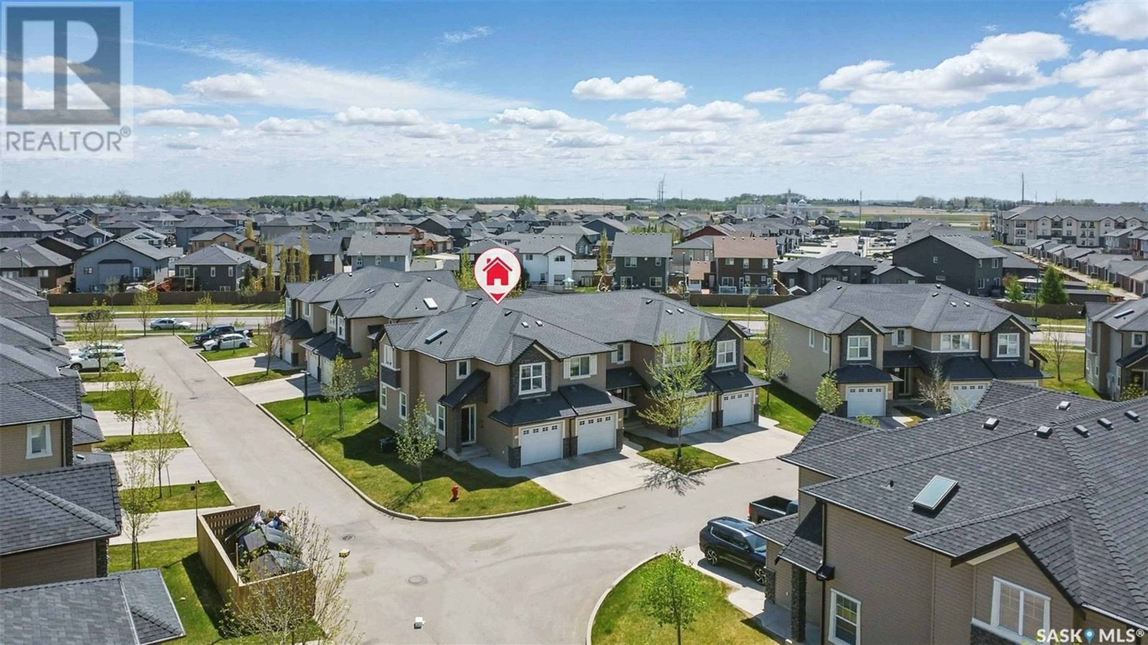 A pic from outside/outdoor area/front of a property/back of a property/a pic from drone, street for 410 - 115 LEDINGHAM WAY, Saskatoon Saskatchewan S7V0C4