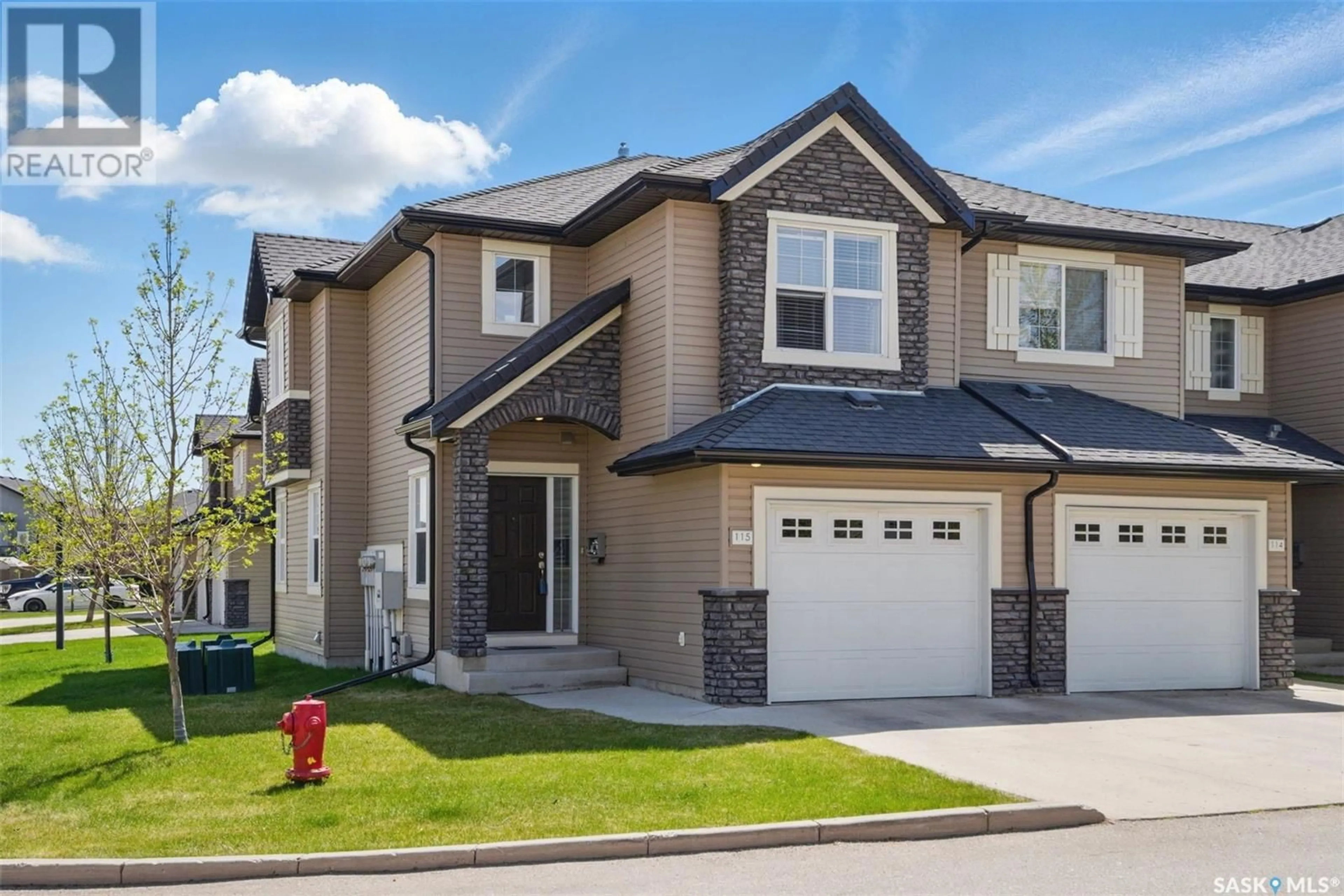Home with vinyl exterior material, street for 410 - 115 LEDINGHAM WAY, Saskatoon Saskatchewan S7V0C4