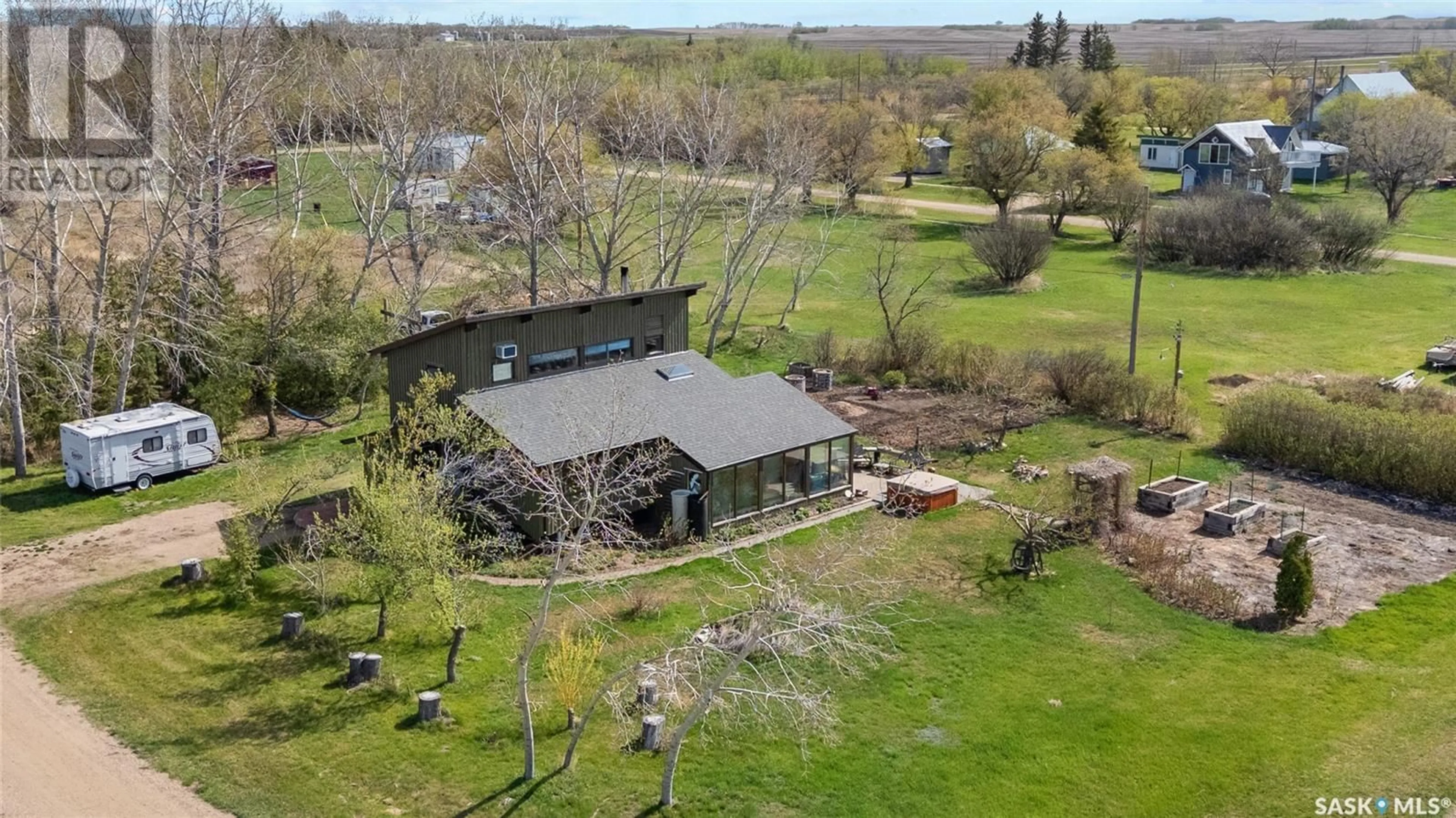 A pic from outside/outdoor area/front of a property/back of a property/a pic from drone, building for 17 OAK STREET, Ruddell Saskatchewan S0M2S0
