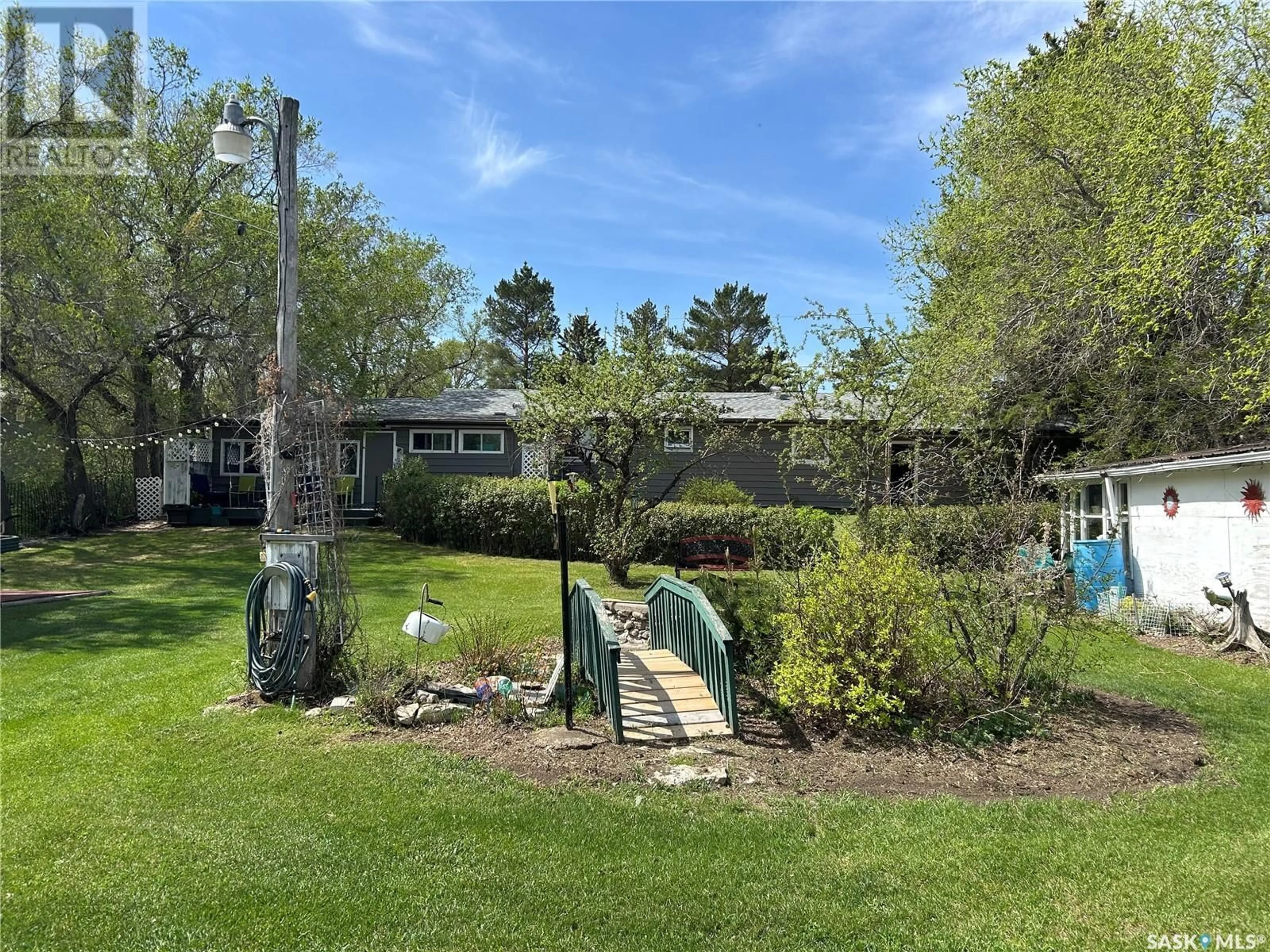 A pic from outside/outdoor area/front of a property/back of a property/a pic from drone, water/lake/river/ocean view for 127 3RD AVENUE, Young Saskatchewan S0K4Y0