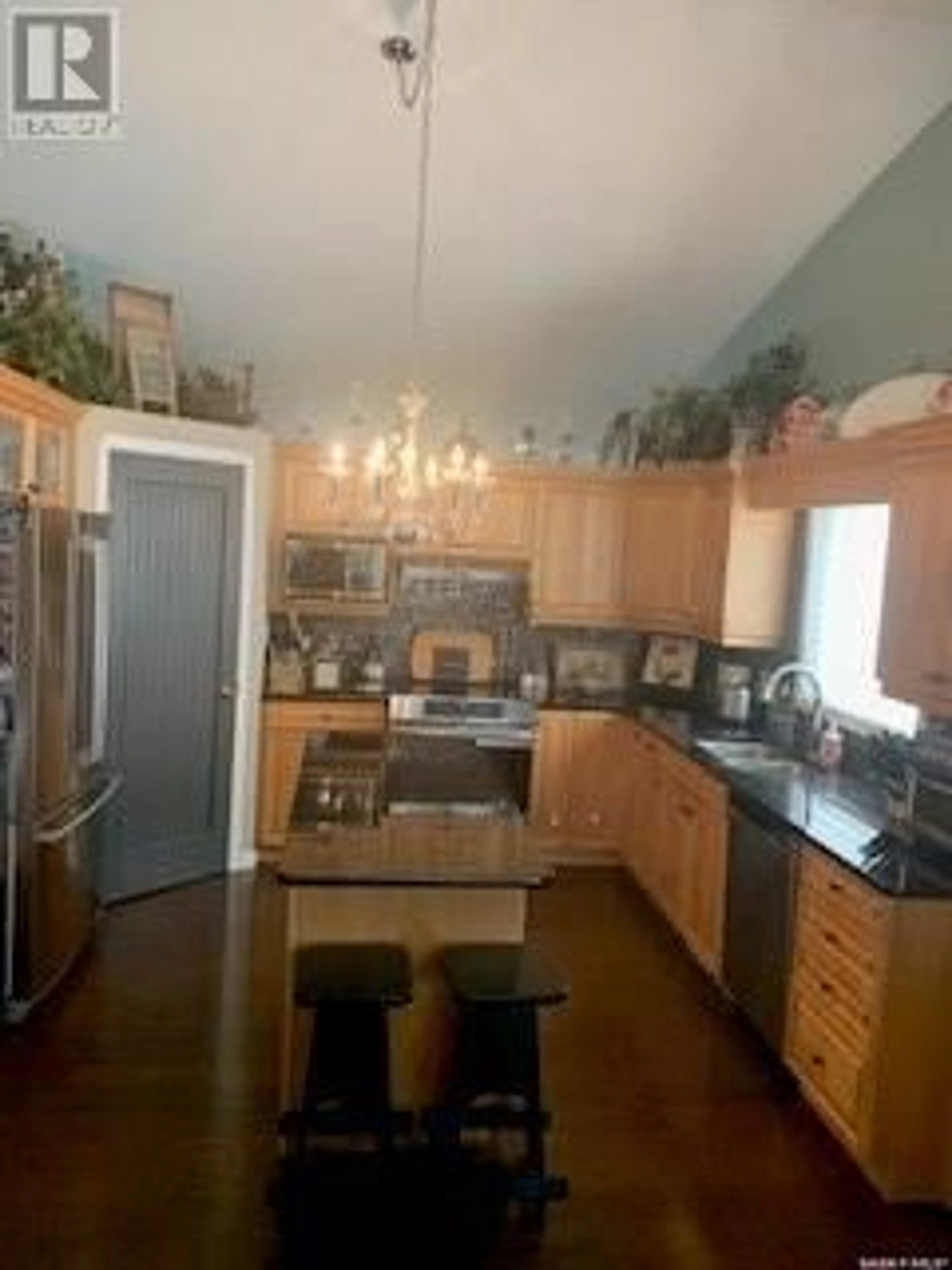 Open concept kitchen, wood/laminate floor for 110 SUNSET CRESCENT, Balcarres Saskatchewan S0G0C0