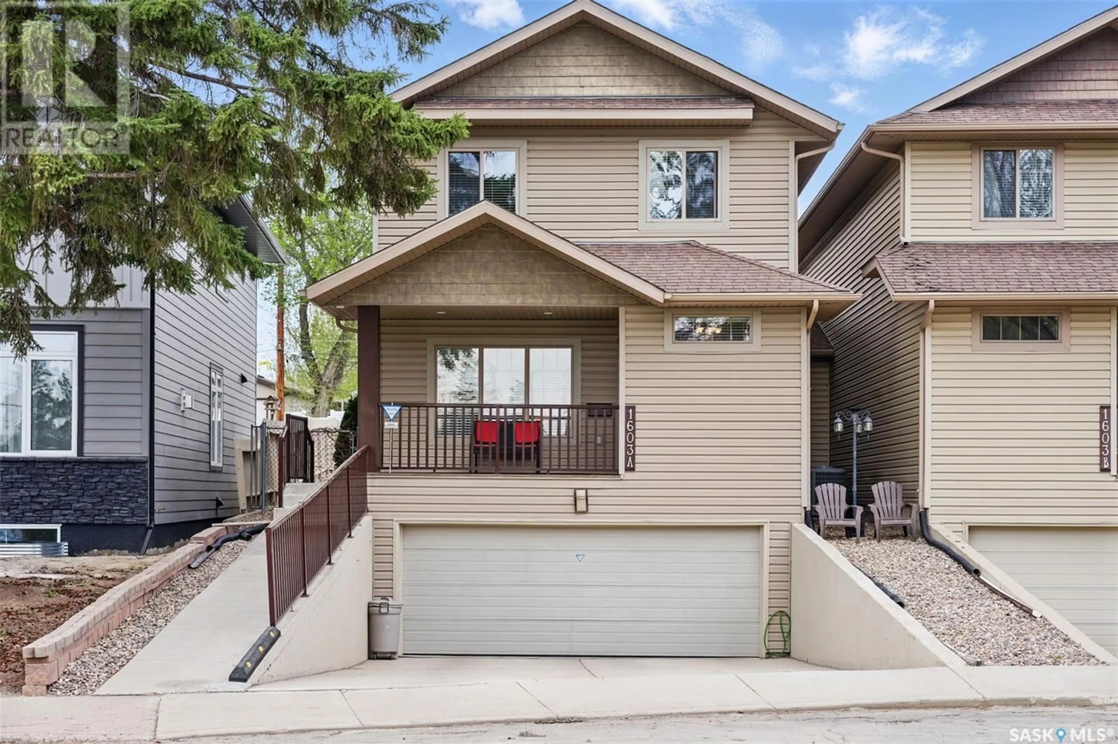 Home with vinyl exterior material, street for 1603A 9TH AVENUE, Saskatoon Saskatchewan S7K2Z9