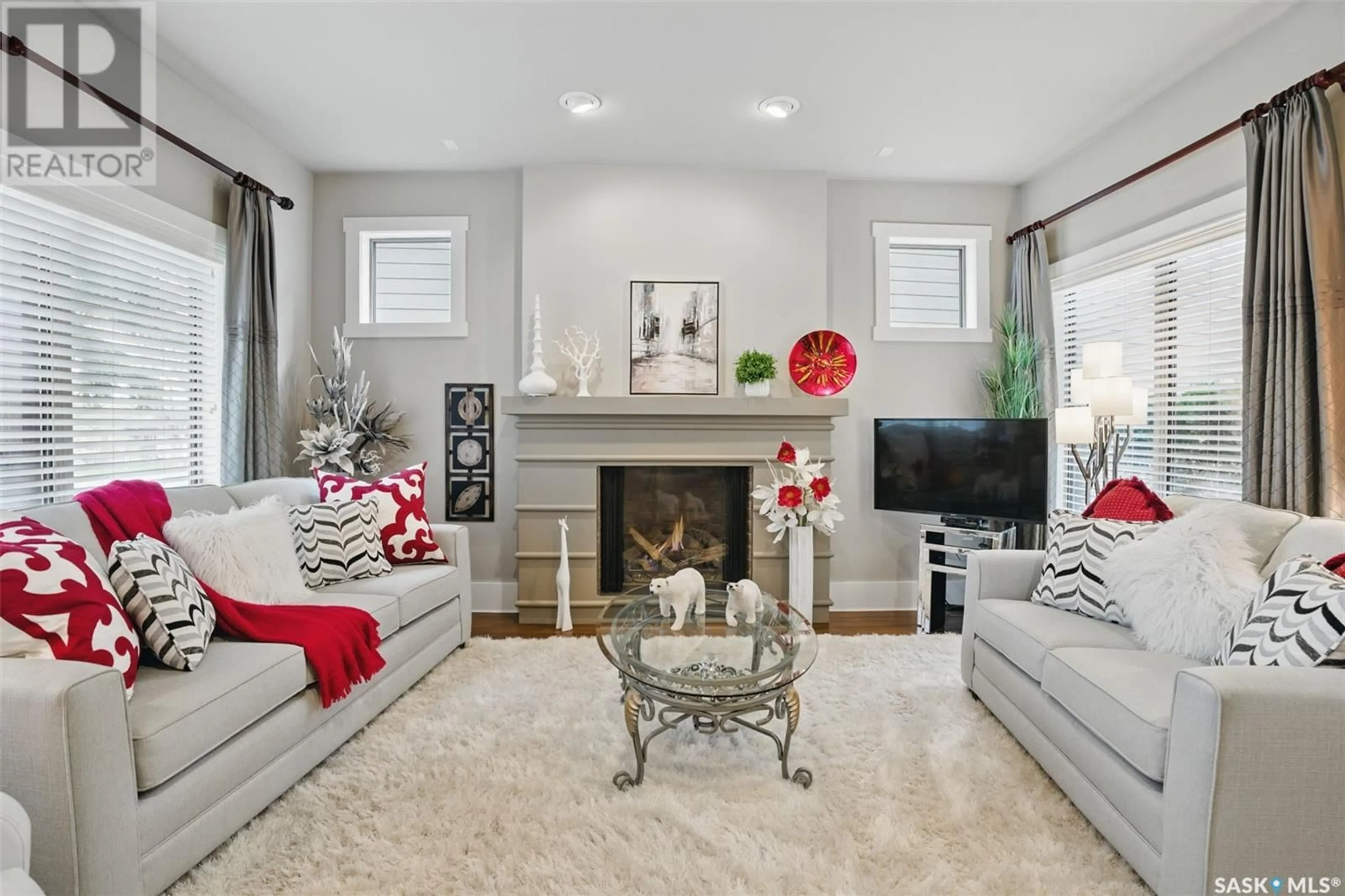 Living room with furniture, carpet floor for 1603A 9TH AVENUE, Saskatoon Saskatchewan S7K2Z9