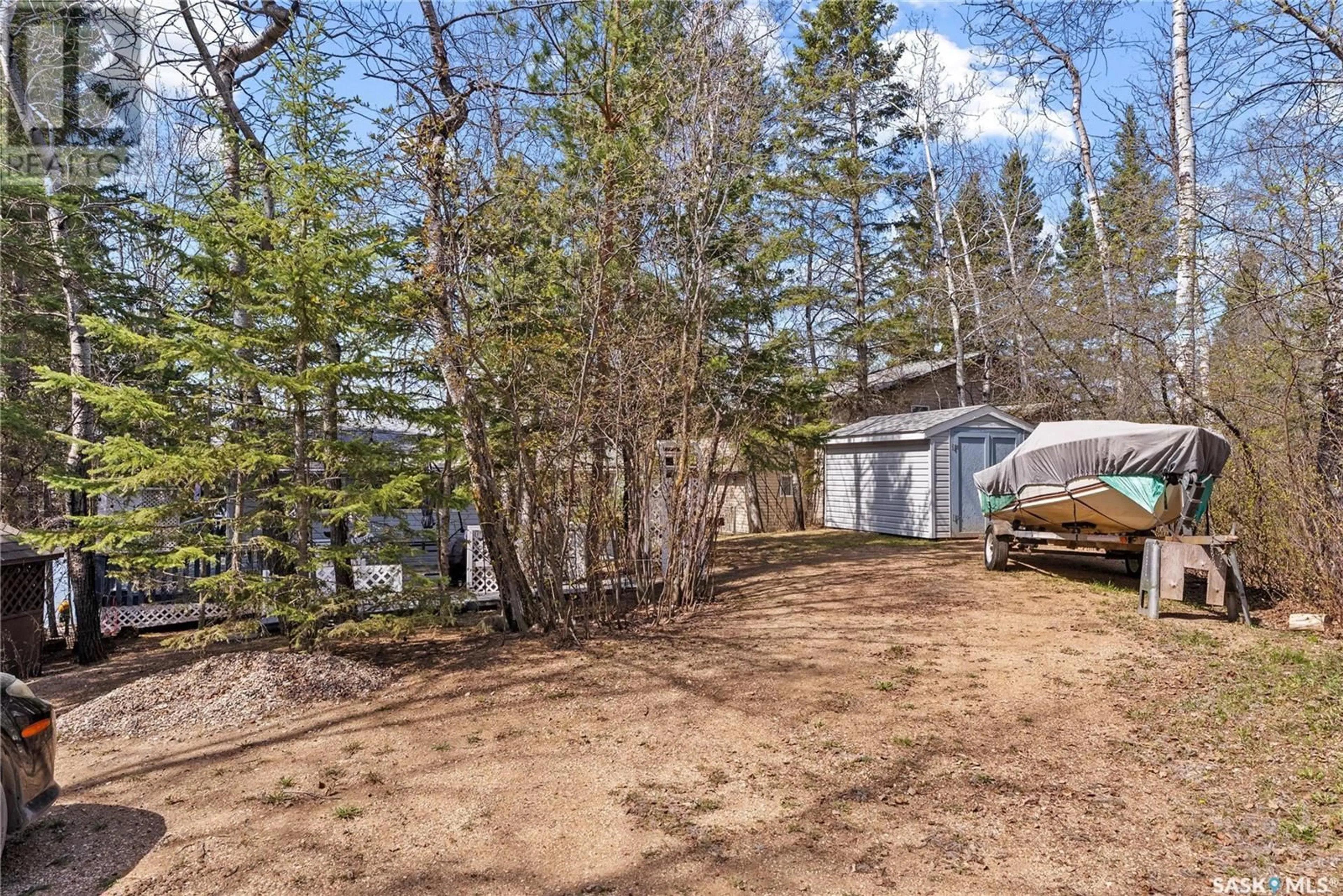 A pic from outside/outdoor area/front of a property/back of a property/a pic from drone, forest/trees view for 55 LOON DRIVE, Big Shell Saskatchewan S0J2G0