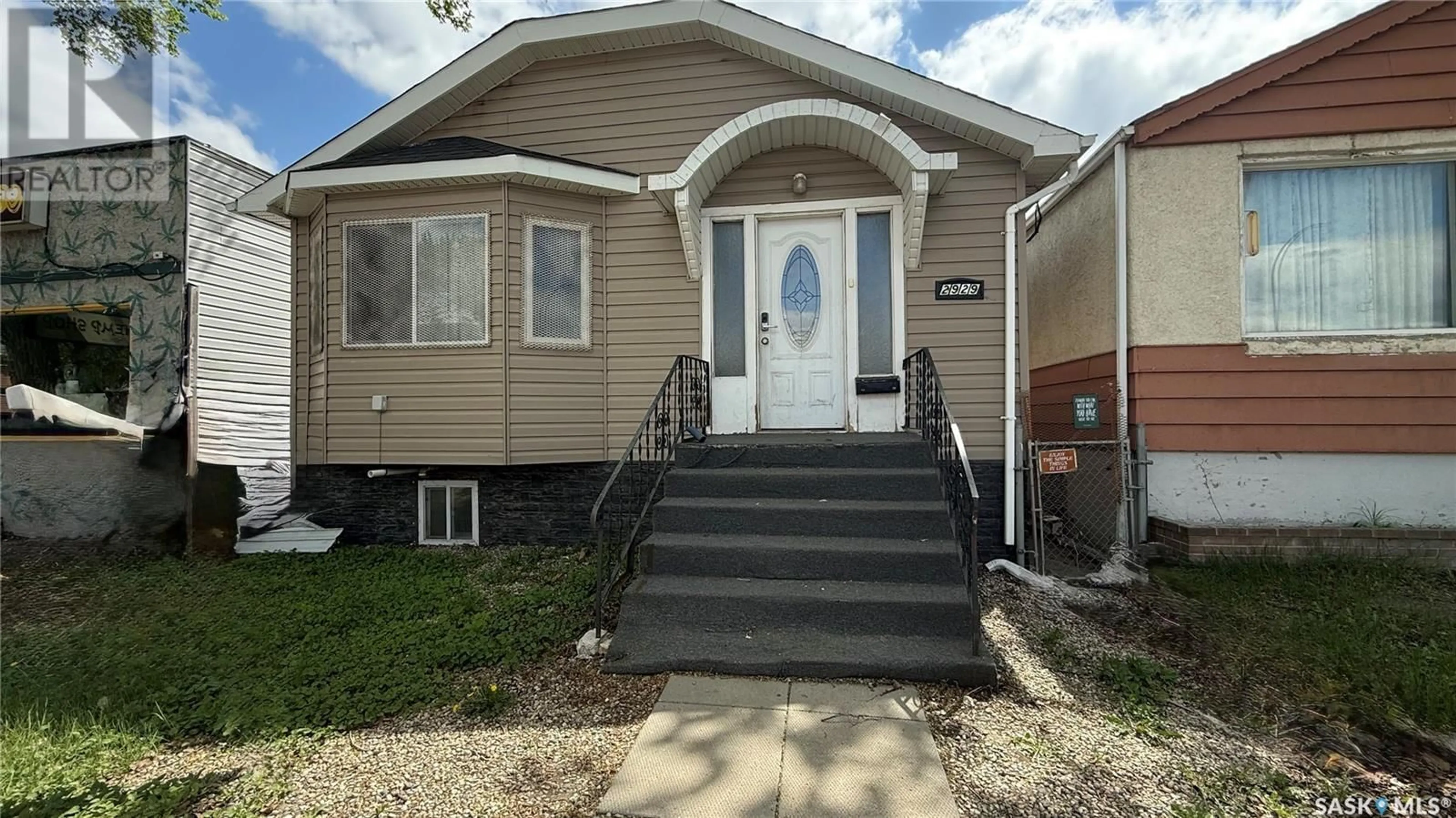 Home with vinyl exterior material, street for 2929 DEWDNEY AVENUE, Regina Saskatchewan S4T0Y1